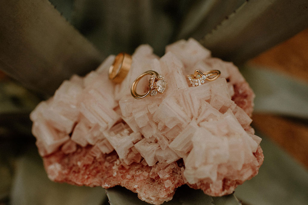 Wedding rings on crystal stone