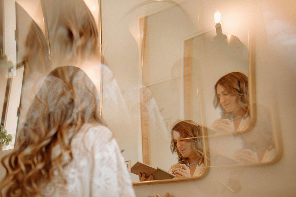 Boho bride getting ready before ceremony
