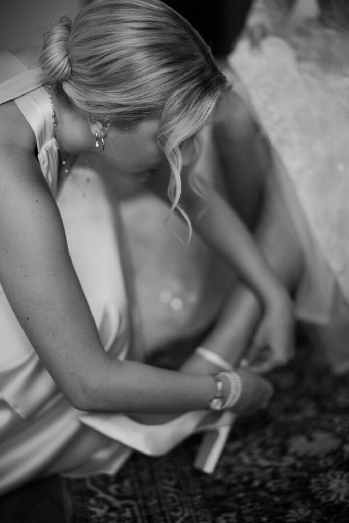 Bride getting dressed for her ceremony