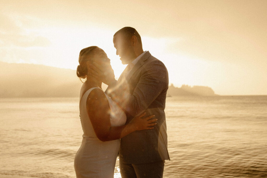 A sunset Kauai elopement on Hanalei Beach captured by Hawaii elopement photographer - Taylor Mccutchan 