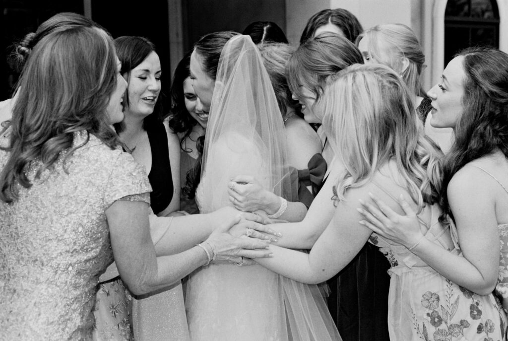 Brides emotional first looks with bridesmaids