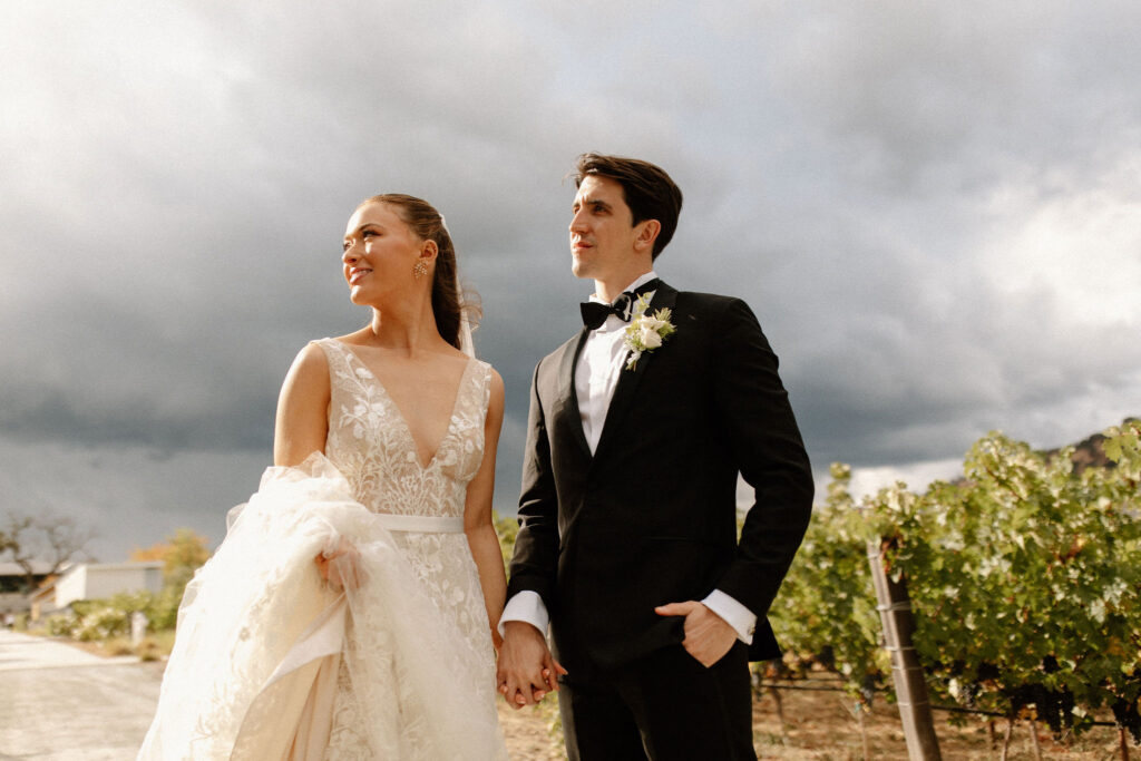Bride and groom portraits in a vineyard from a Four Seasons Napa Valley wedding