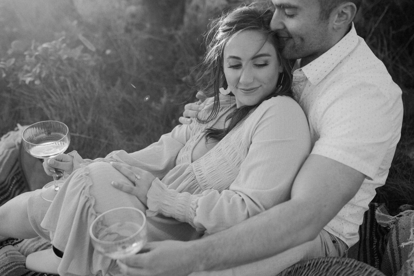 Couples Sonoma coast engagement photos with a picnic