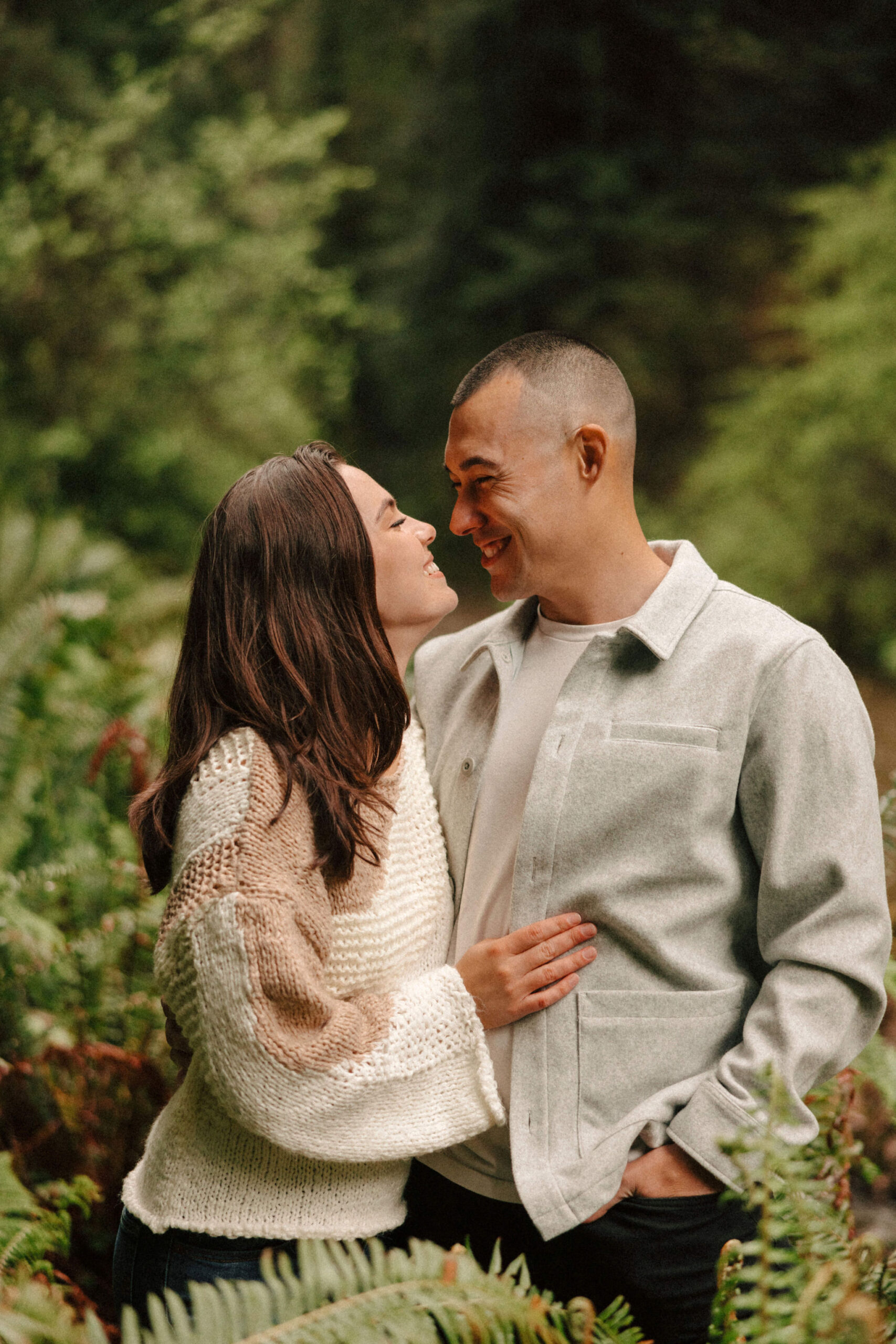 couple pose together during their California engagement photoshoot