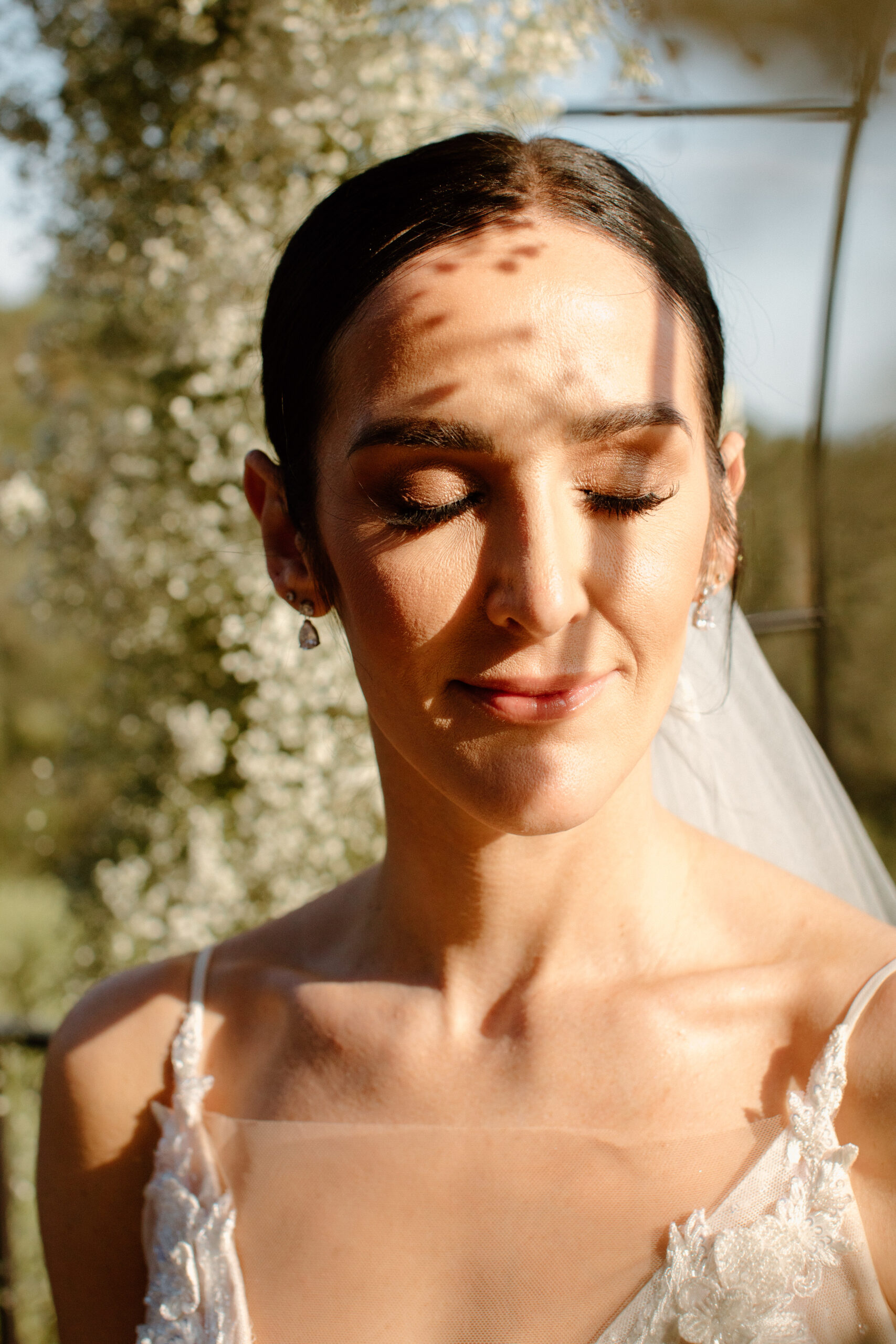 bride poses after her dreamy mountain view wedding