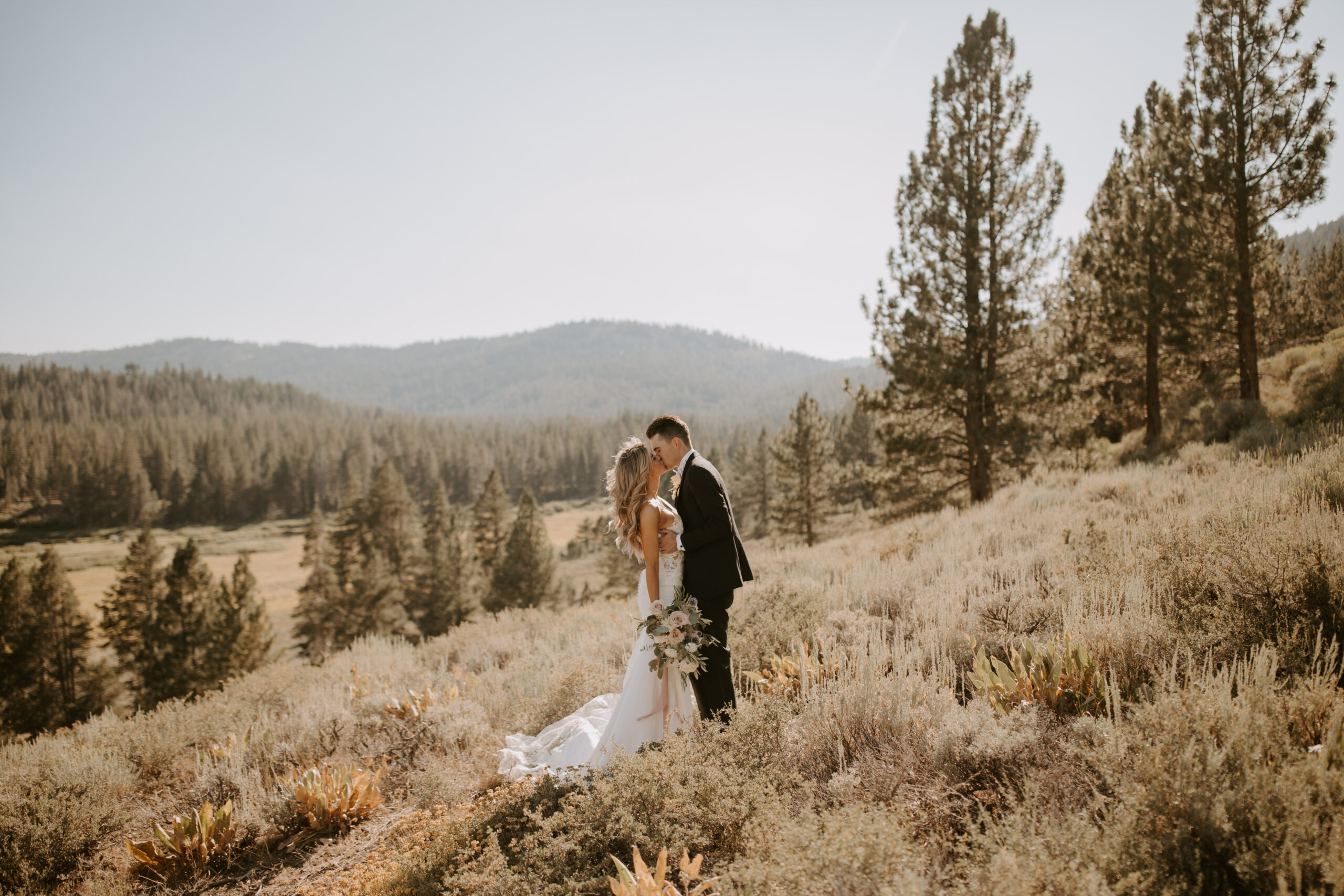 bride and groom pose together after stunning Lake Tahoe wedding