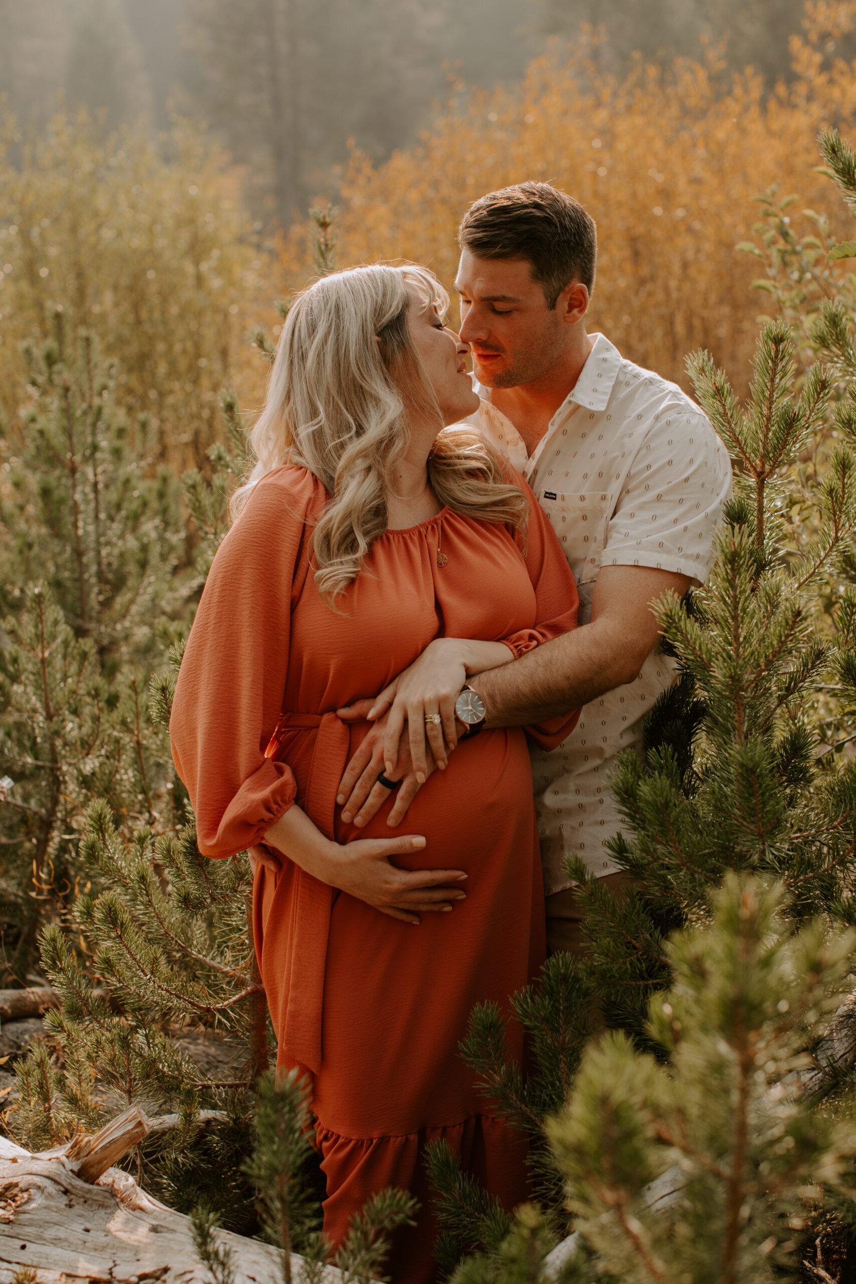 stunning couple pose together during their outdoor Northern California maternity photoshoot