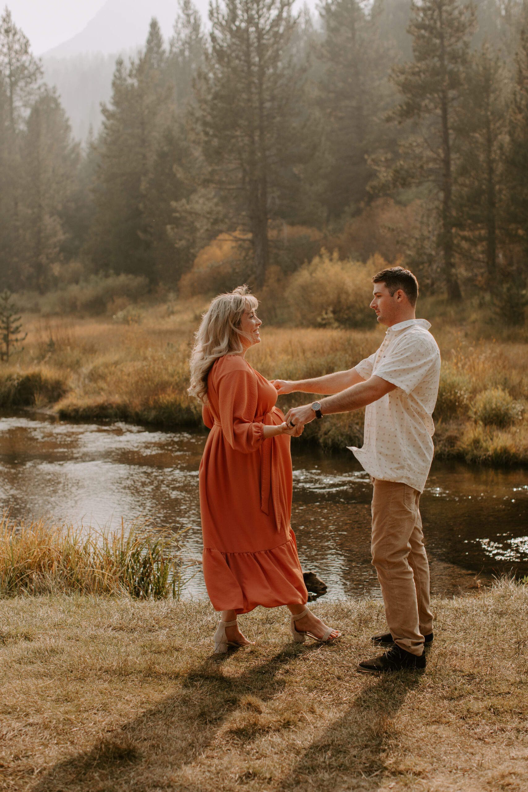 stunning couple pose together during their outdoor Northern California maternity photoshoot