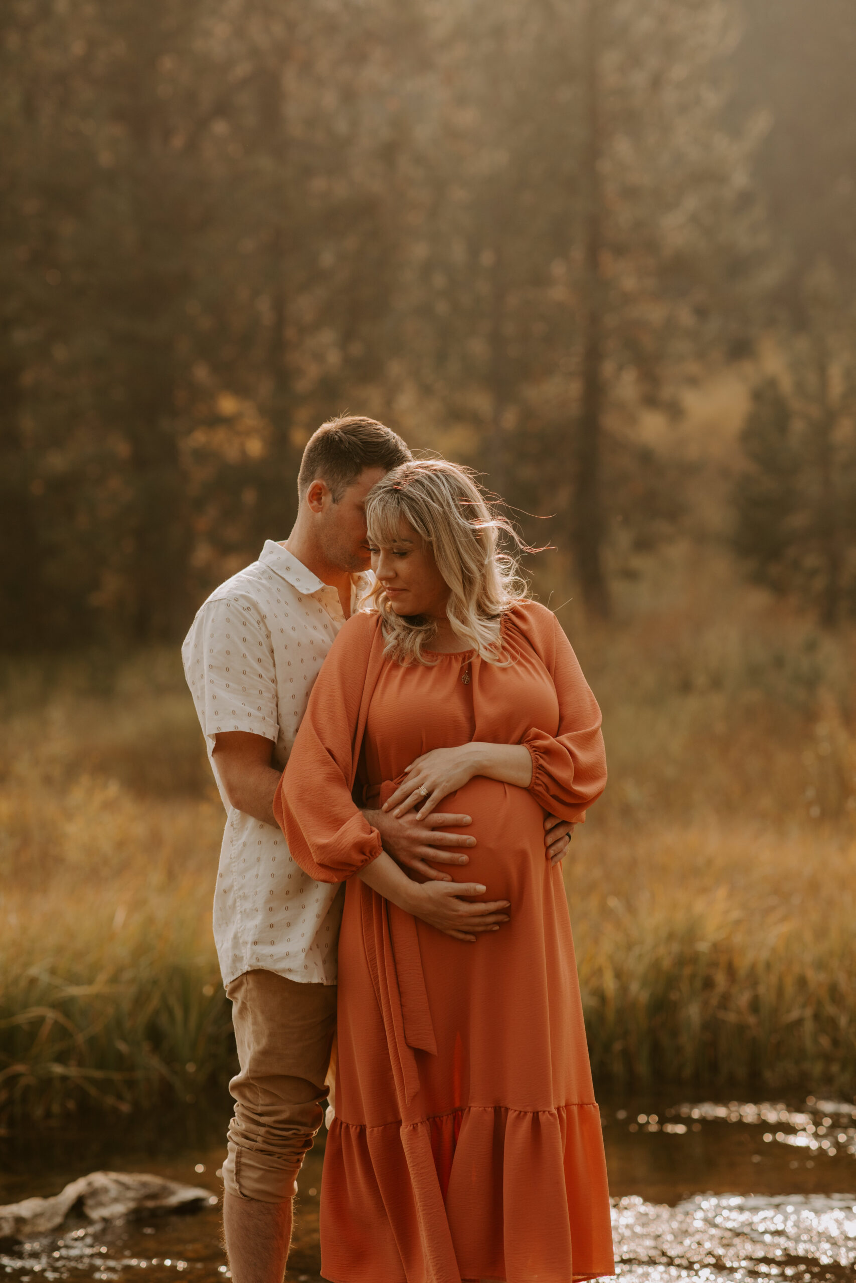 stunning couple pose together during their outdoor Northern California maternity photoshoot