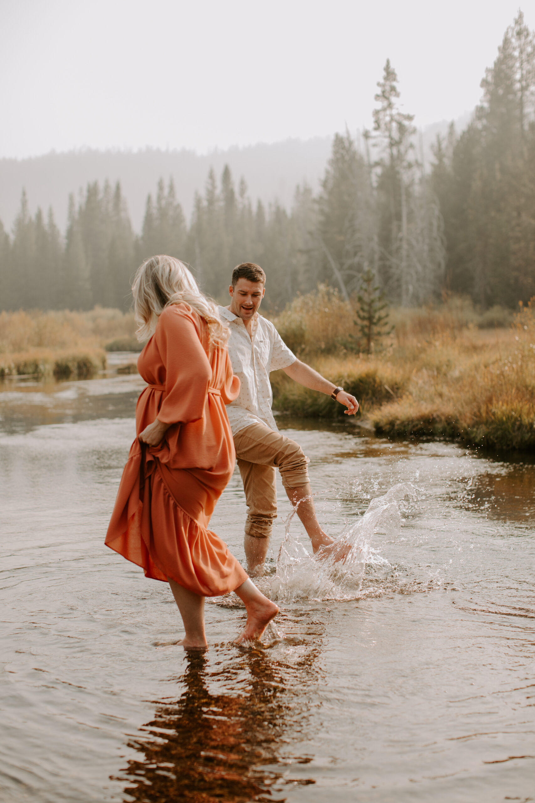 stunning couple pose together during their outdoor Northern California maternity photoshoot