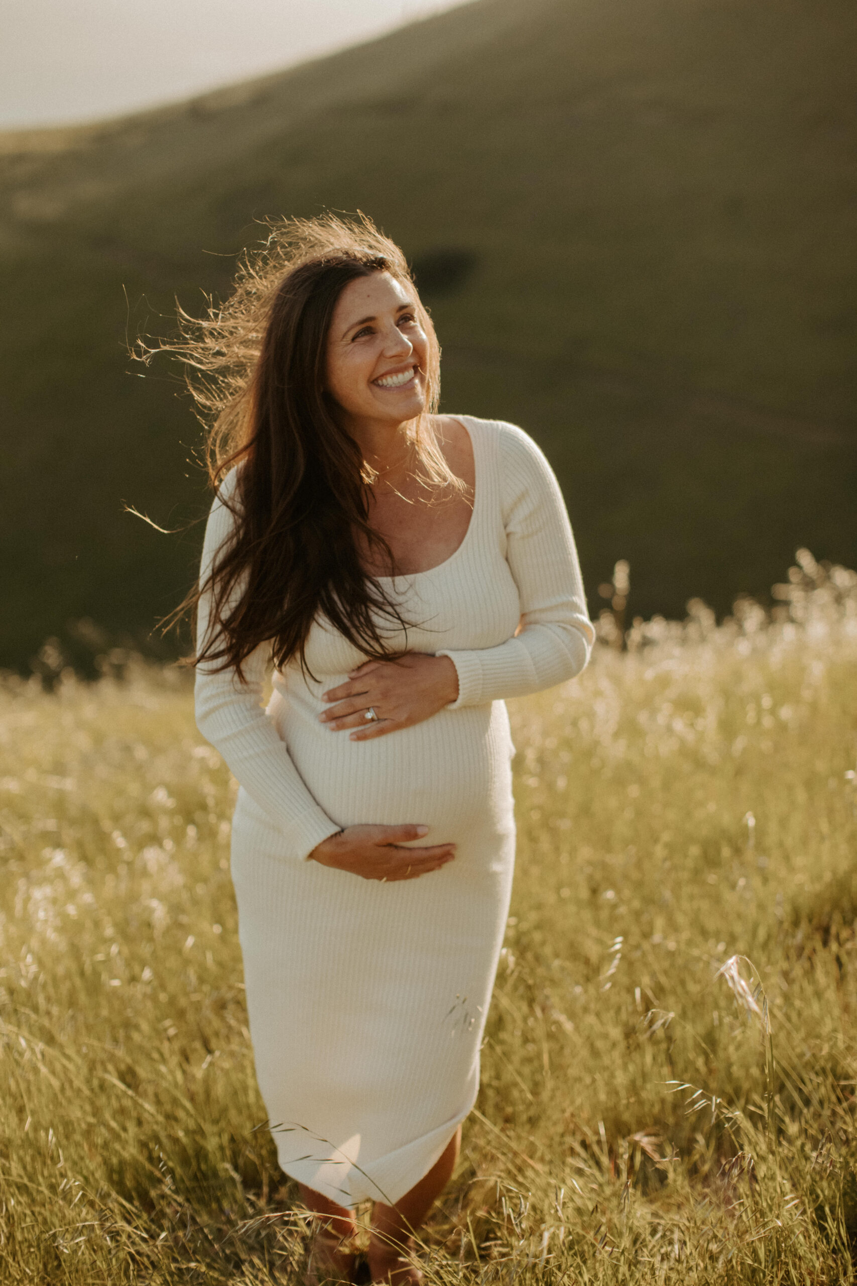 future mom poses during her Northern California maternity photoshoot in nature