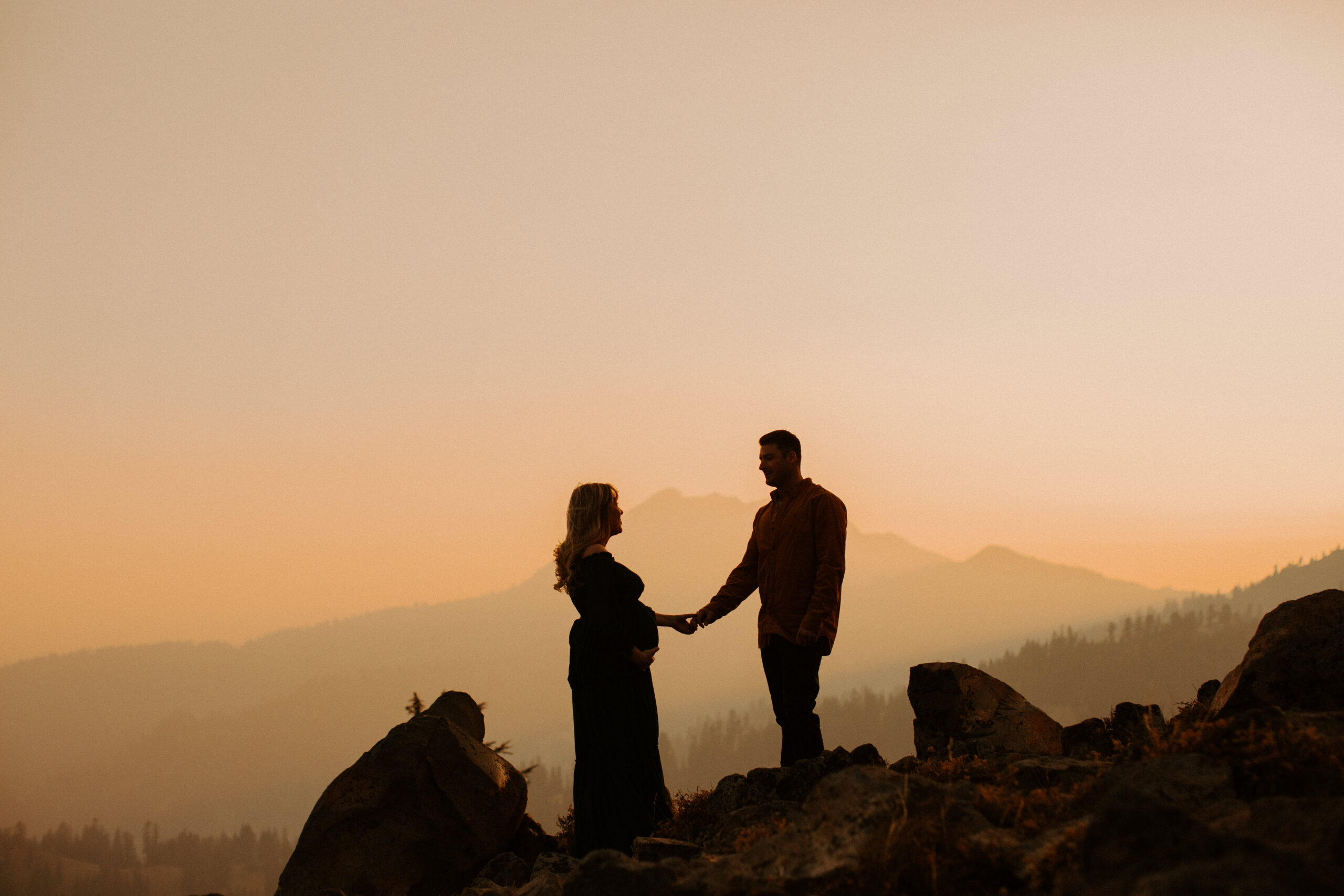 stunning couple pose together during their outdoor Northern California maternity photoshoot