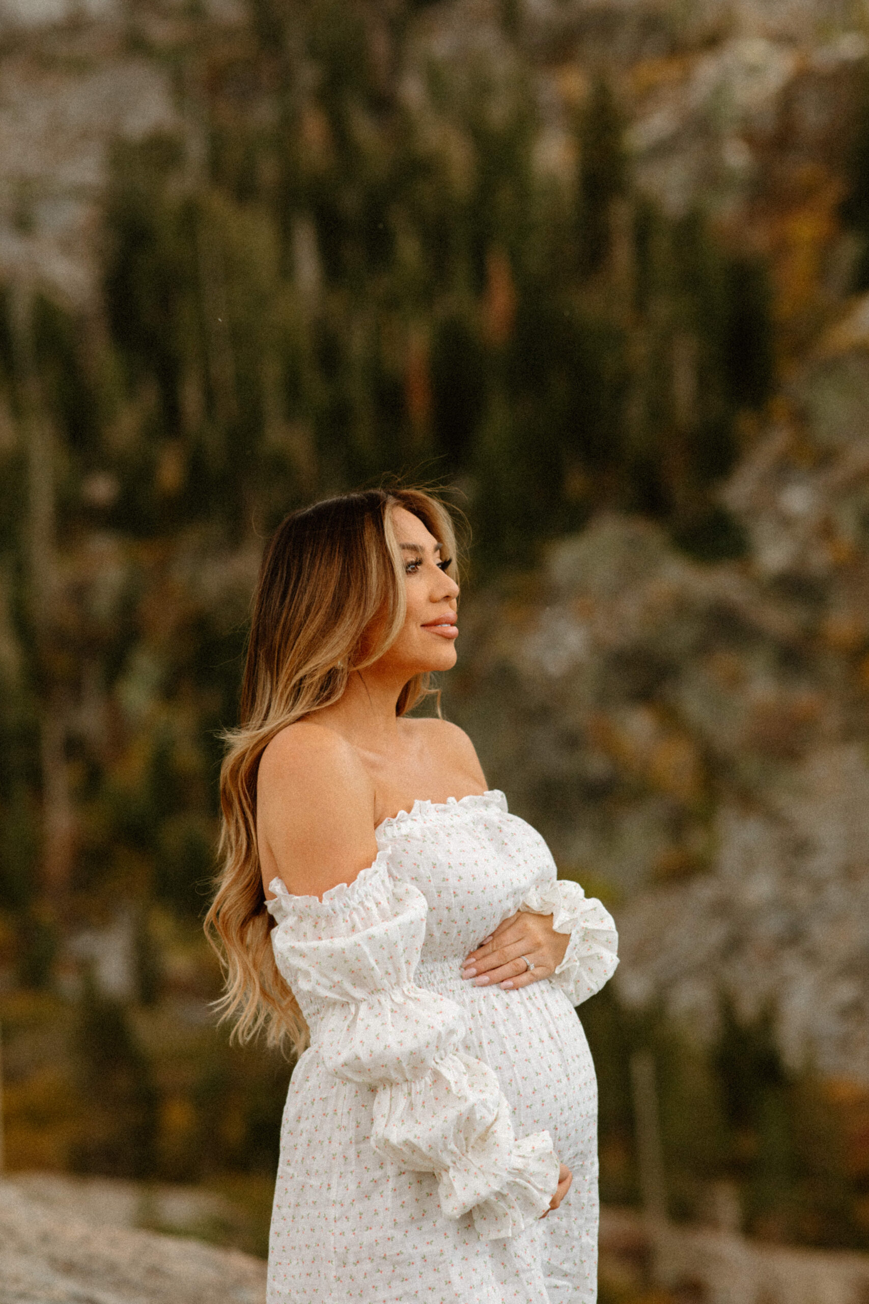 future mom poses during her Northern California maternity photoshoot in nature