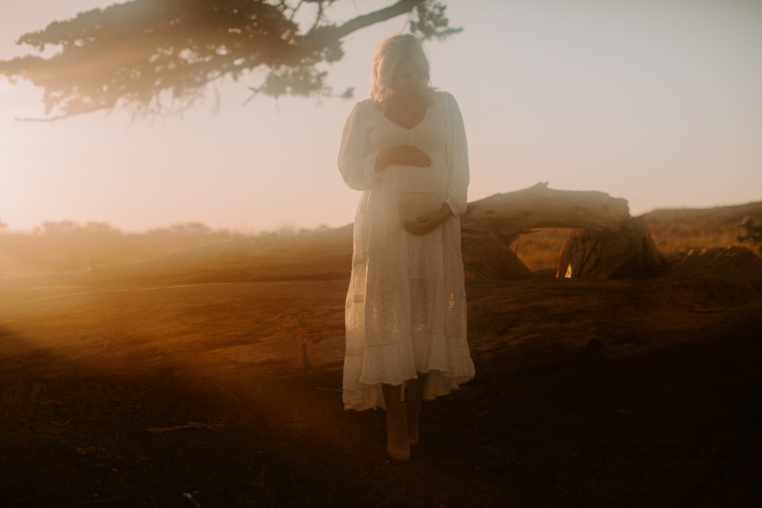 future mom poses during her Northern California maternity photoshoot in nature