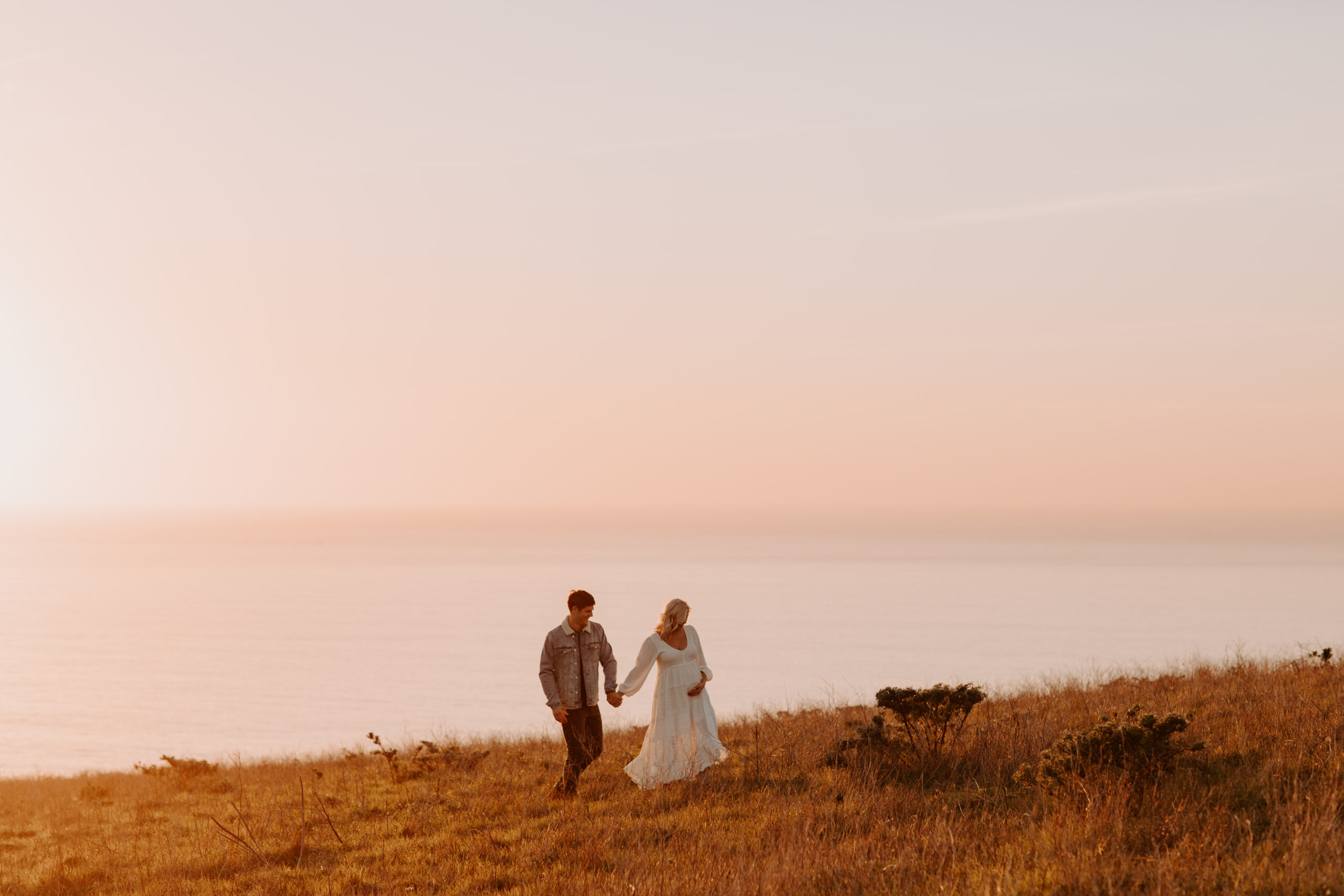 stunning couple pose together during their outdoor Northern California maternity photoshoot