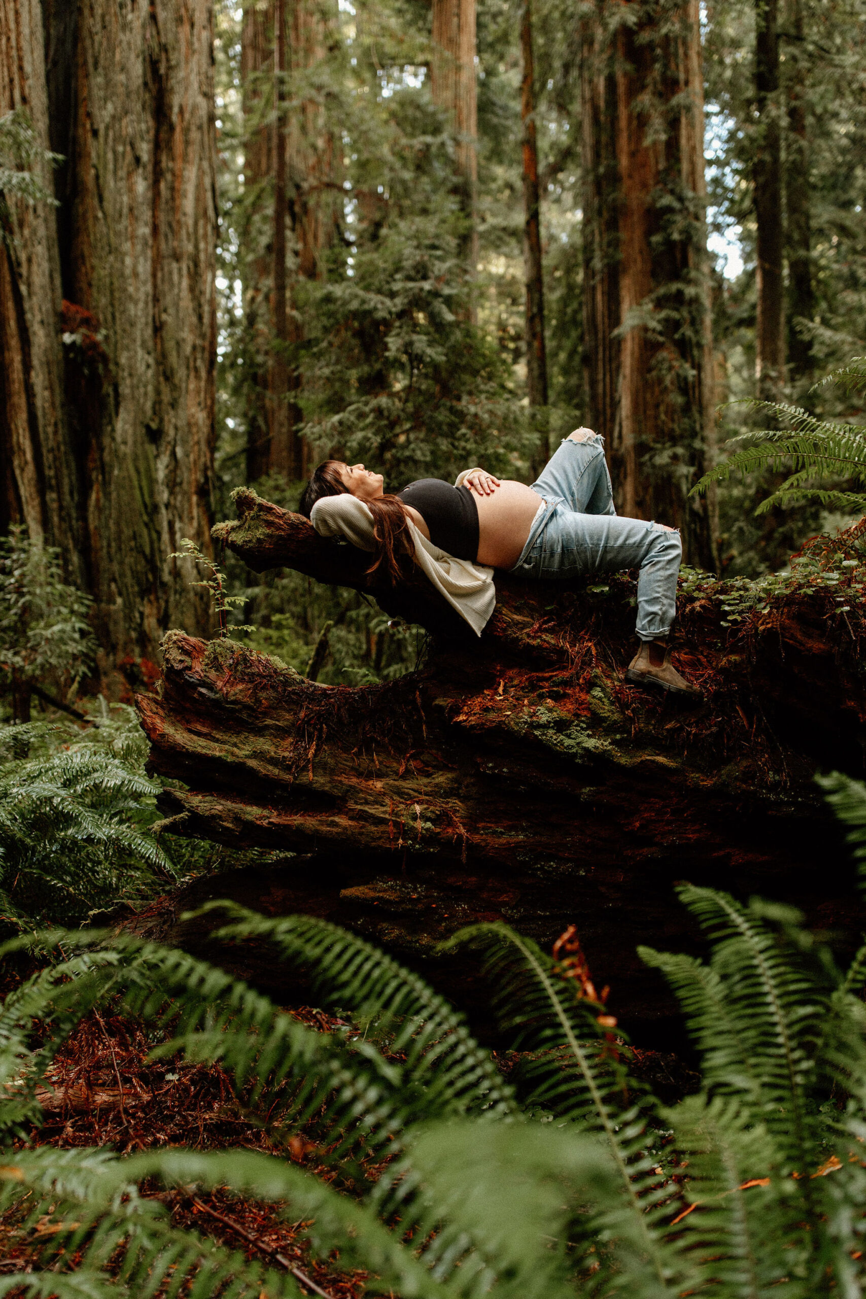 future mom poses during her Northern California maternity photoshoot in nature