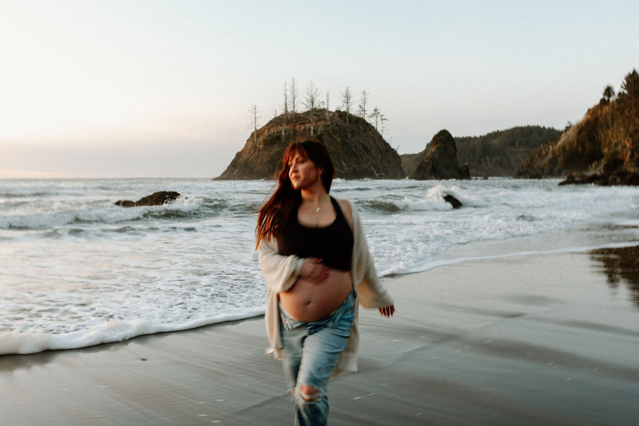 future mom poses during her Northern California maternity photoshoot in nature