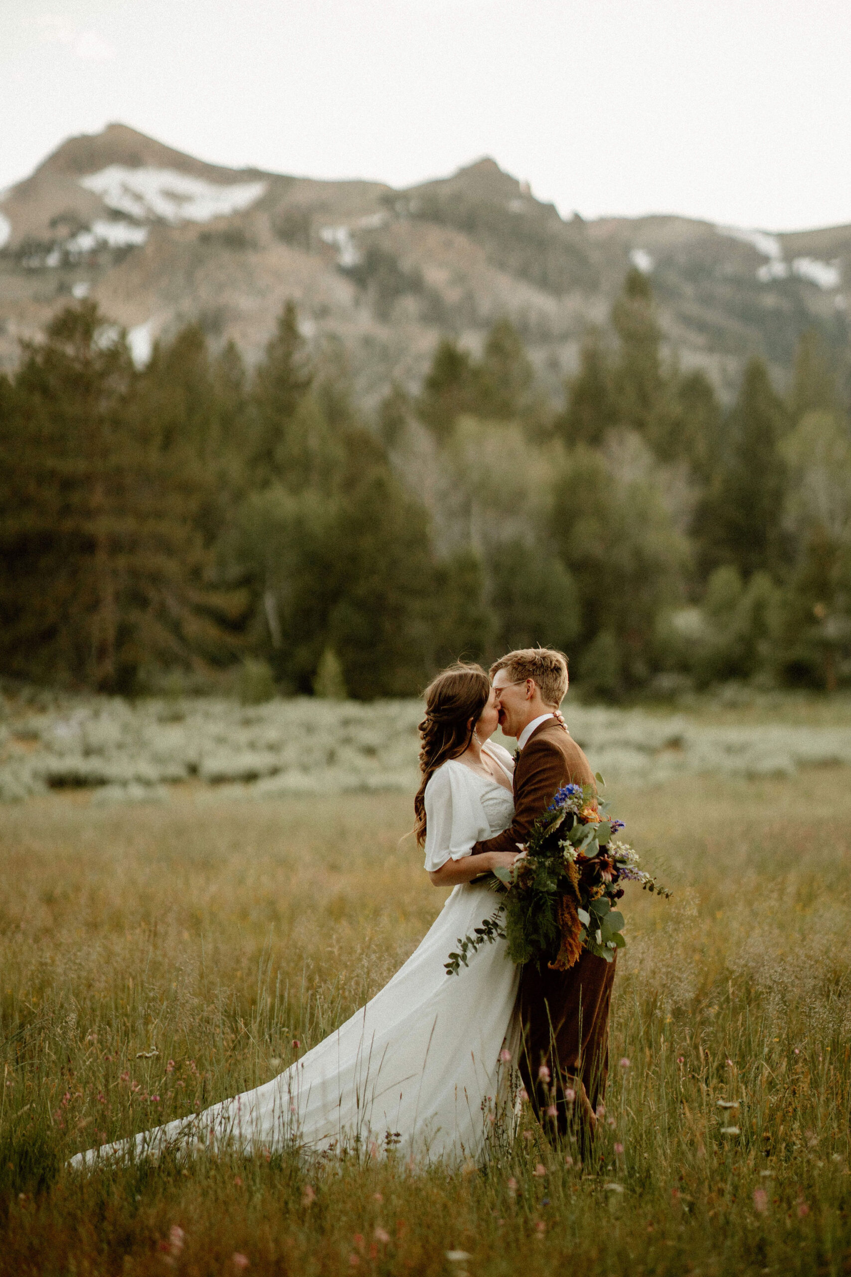 bride and groom pose together after stunning Lake Tahoe wedding