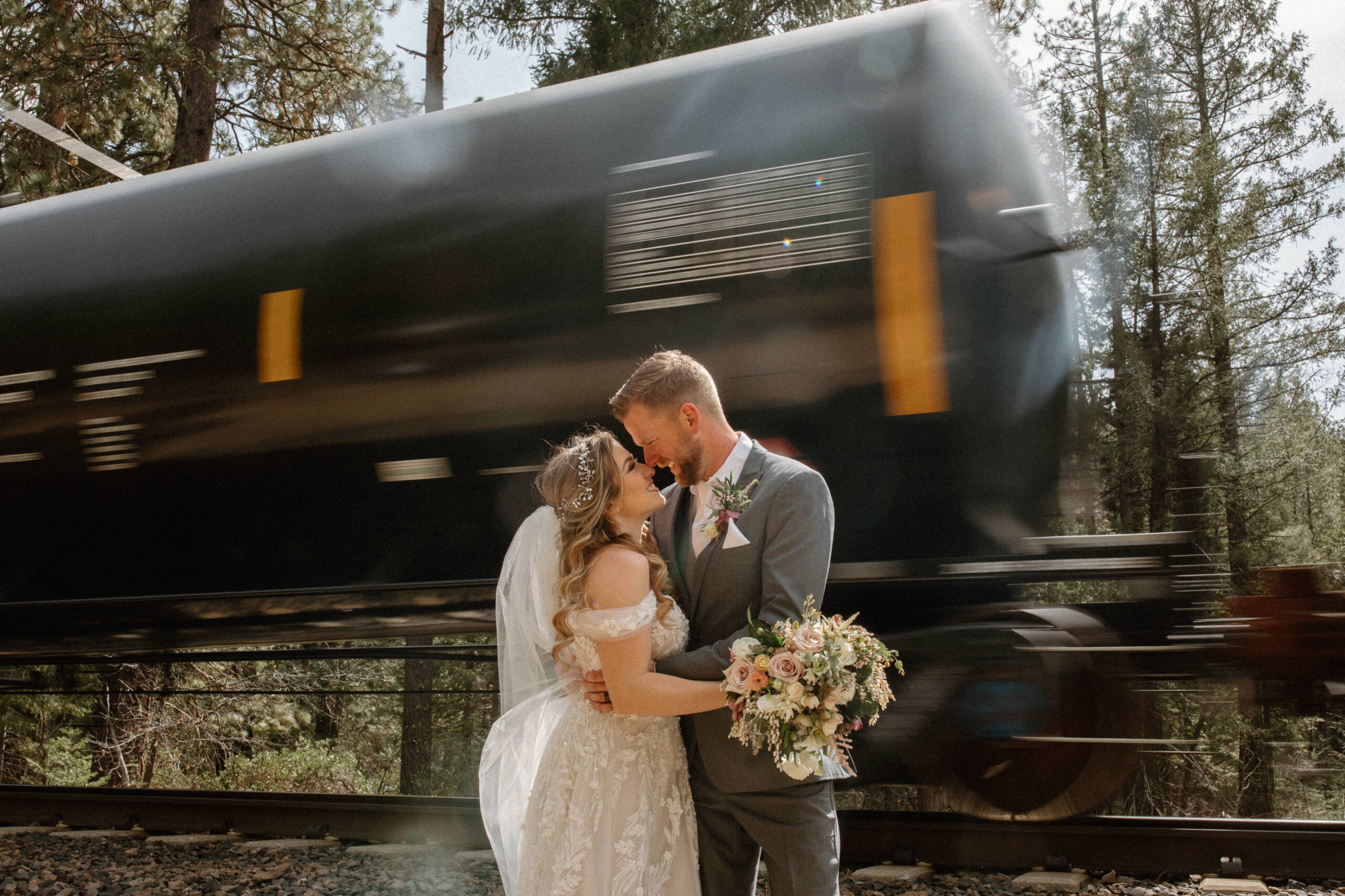 bride and groom pose together after stunning Lake Tahoe wedding