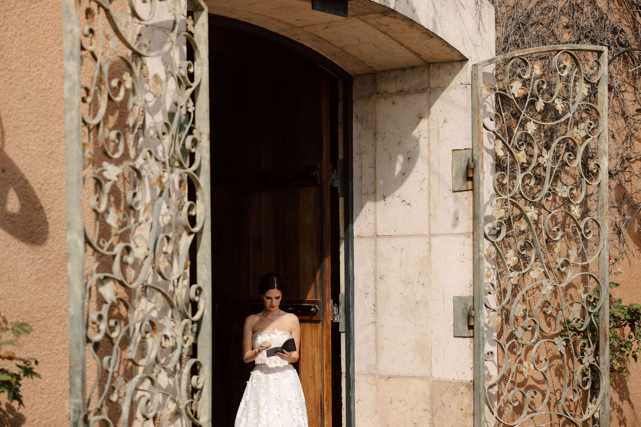 bride poses shortly after finishing her prep