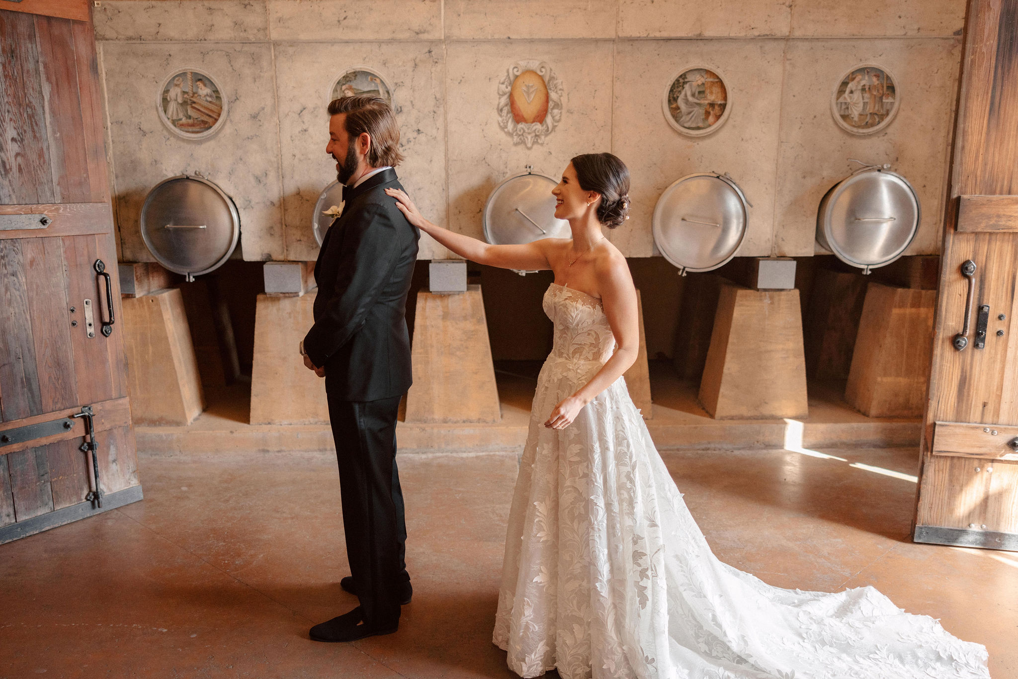 bride and groom share an intimate moment during their candid first look photoshoot