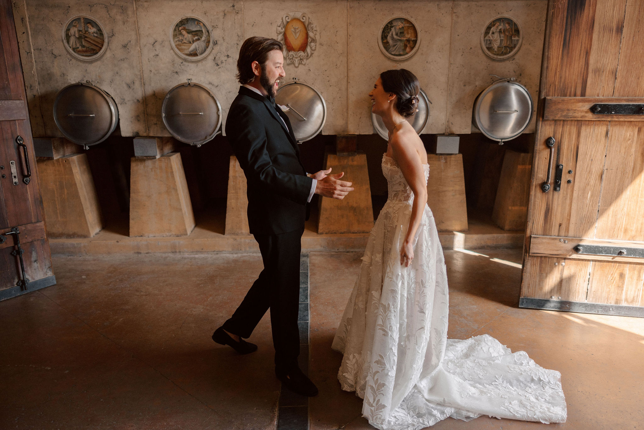 bride and groom share an intimate moment during their candid first look photoshoot