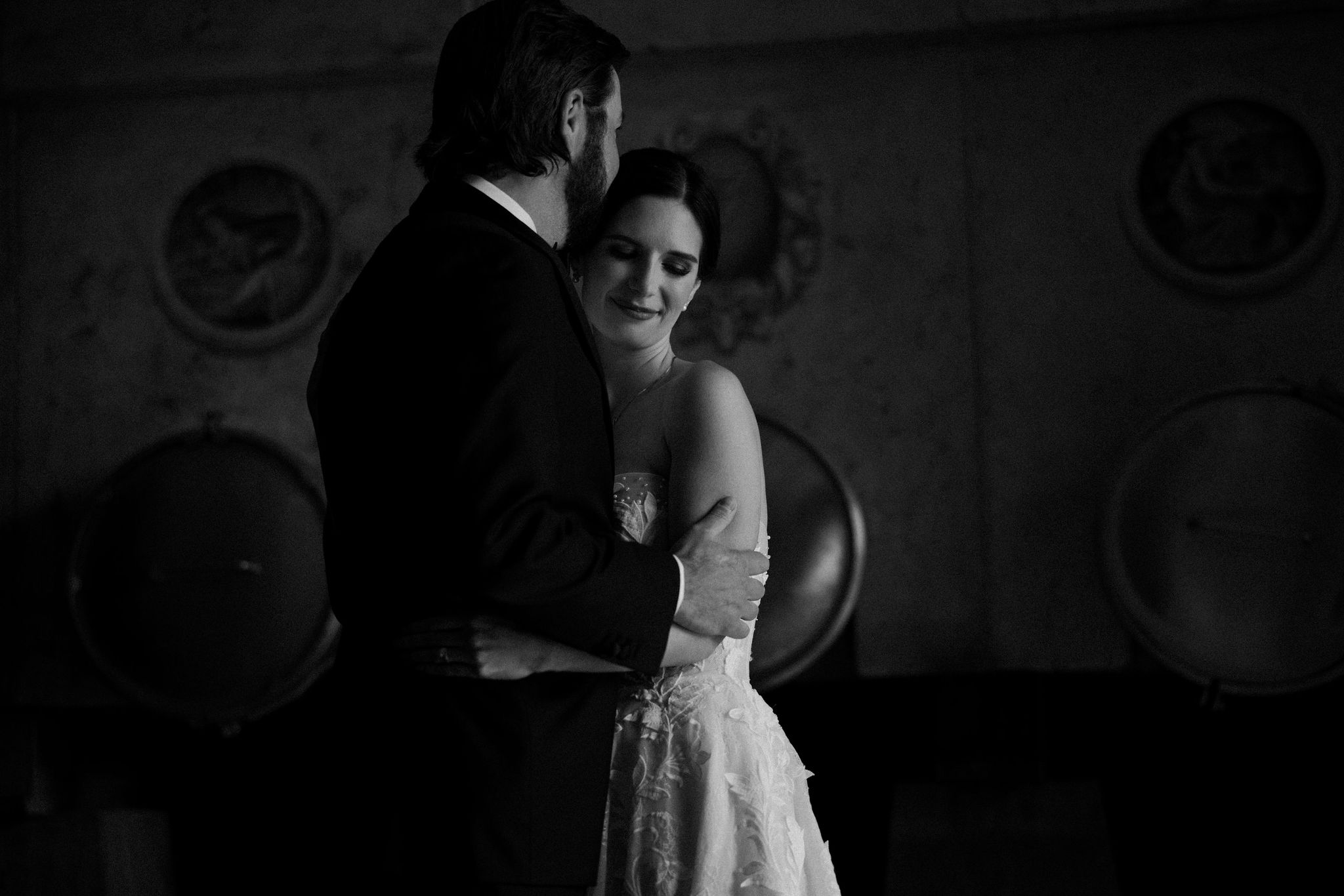 bride and groom share an intimate moment during their candid first look photoshoot