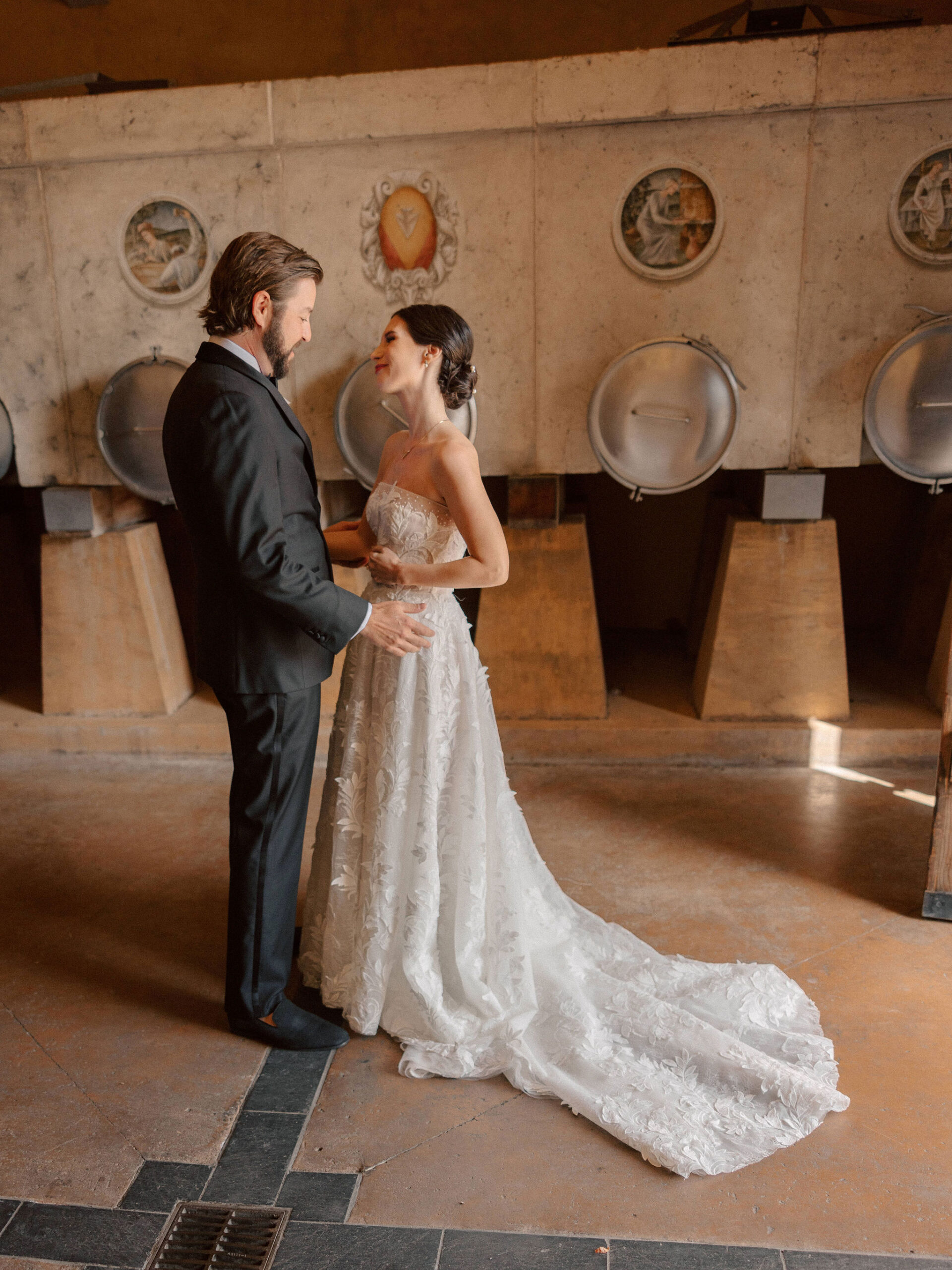 beautiful bride and groom pose together on their stunning California winery wedding day