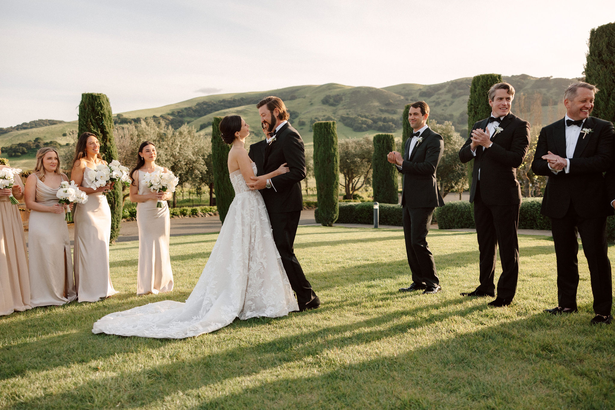 beautiful bride and groom pose together on their stunning California winery wedding day