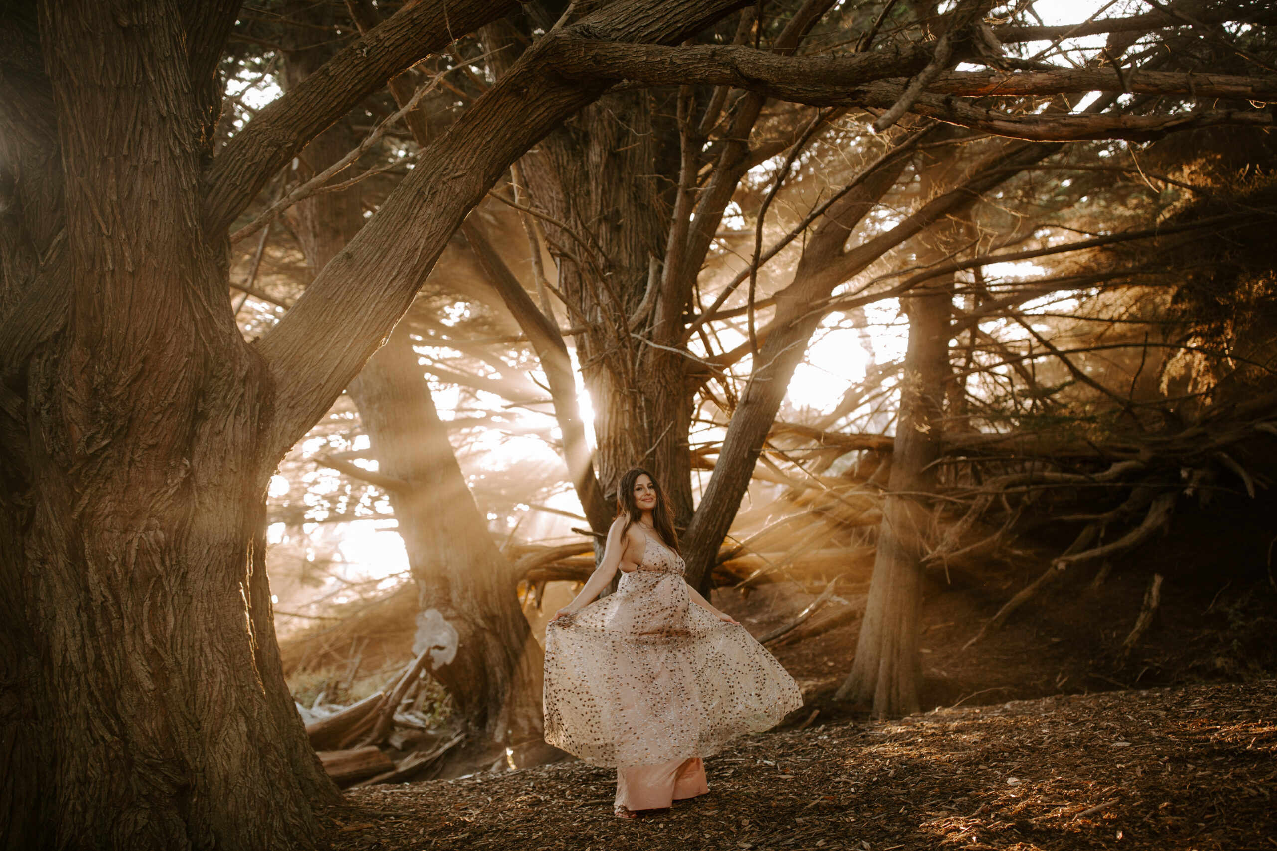 future mom poses during her Northern California maternity photoshoot in nature