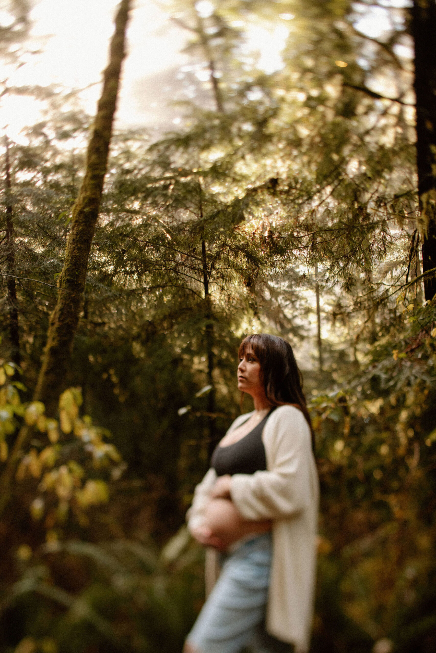 future mom poses during her Northern California maternity photoshoot in nature