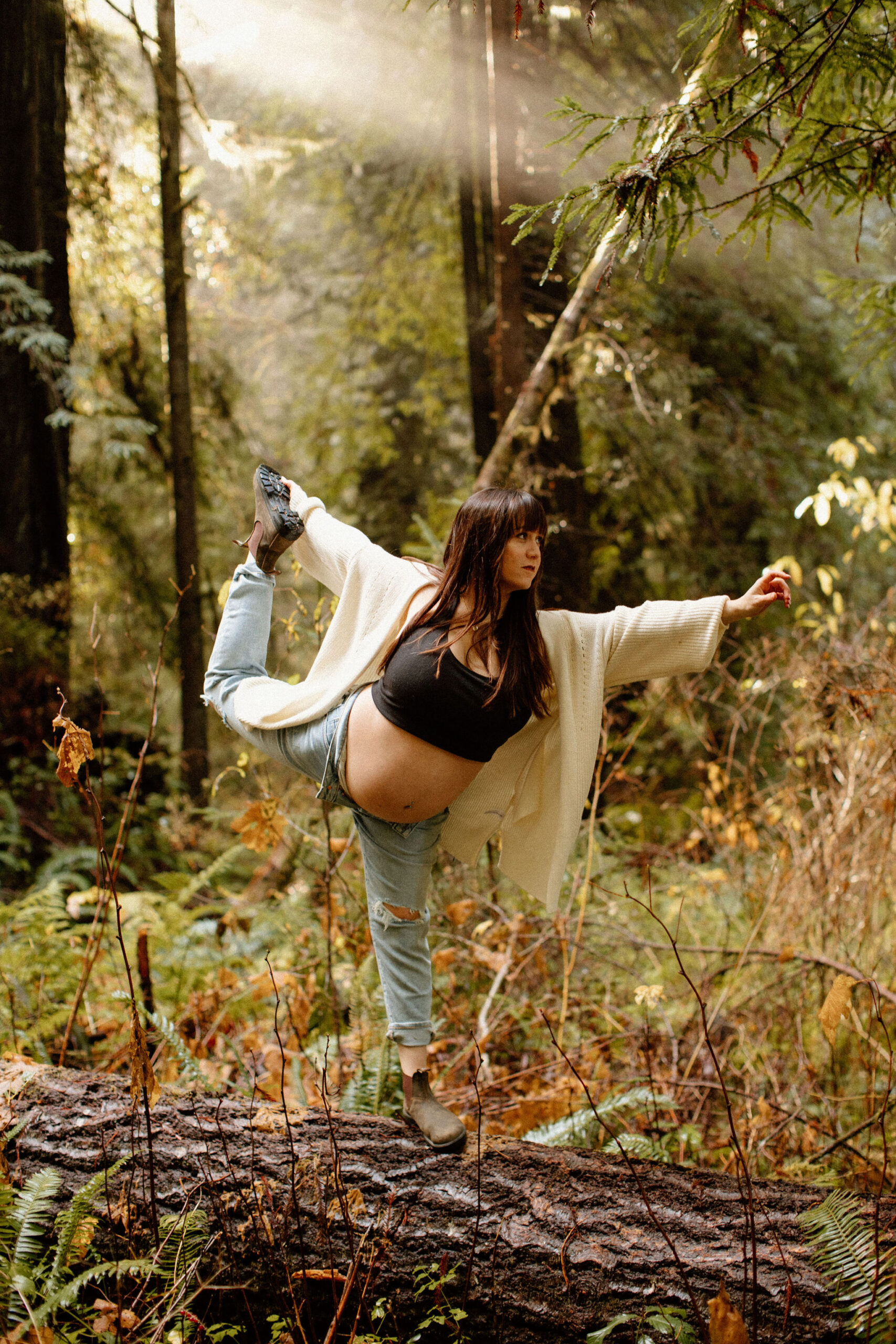 future mom poses during her Northern California maternity photoshoot in nature