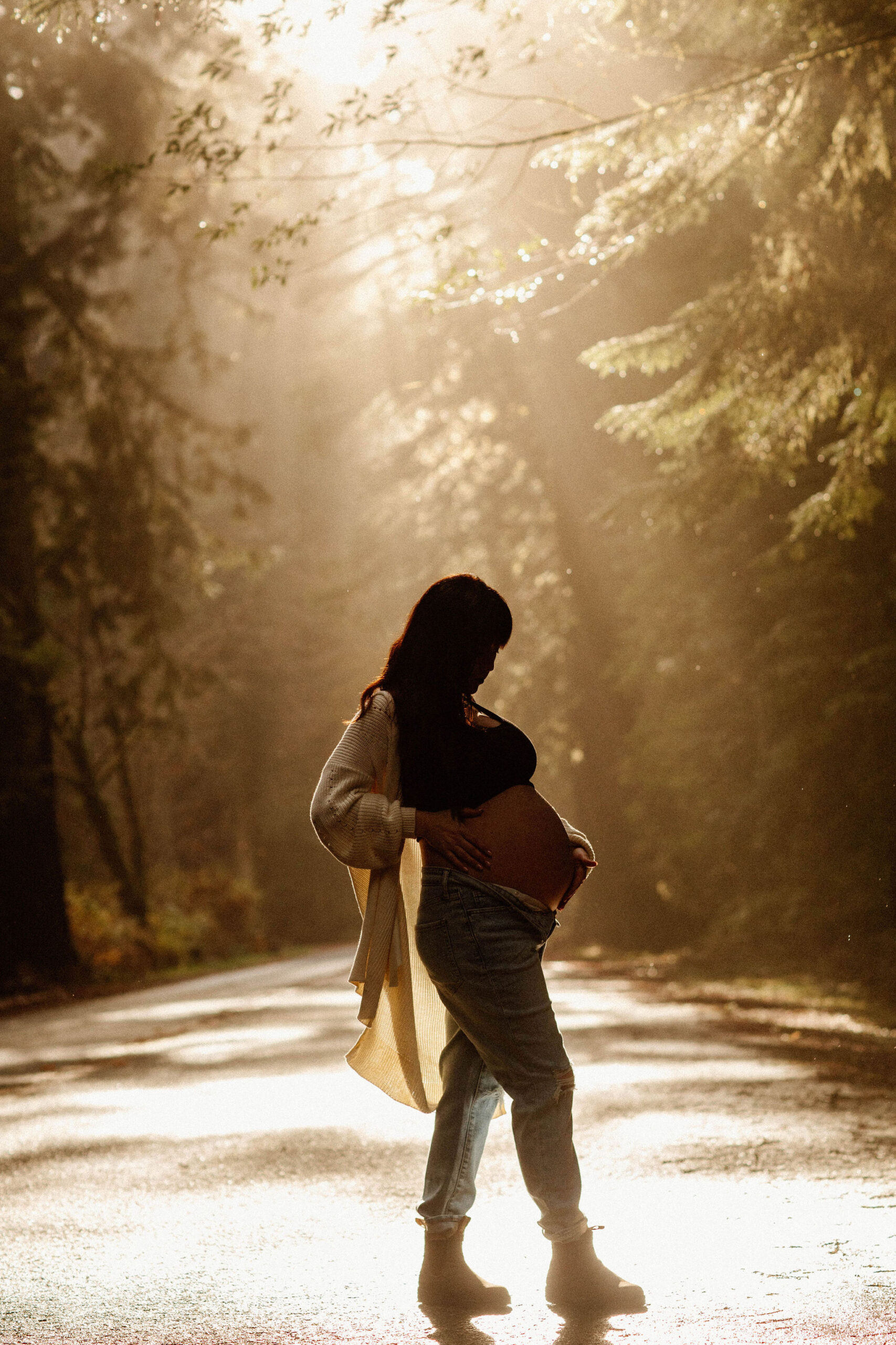 future mom poses during her Northern California maternity photoshoot in nature