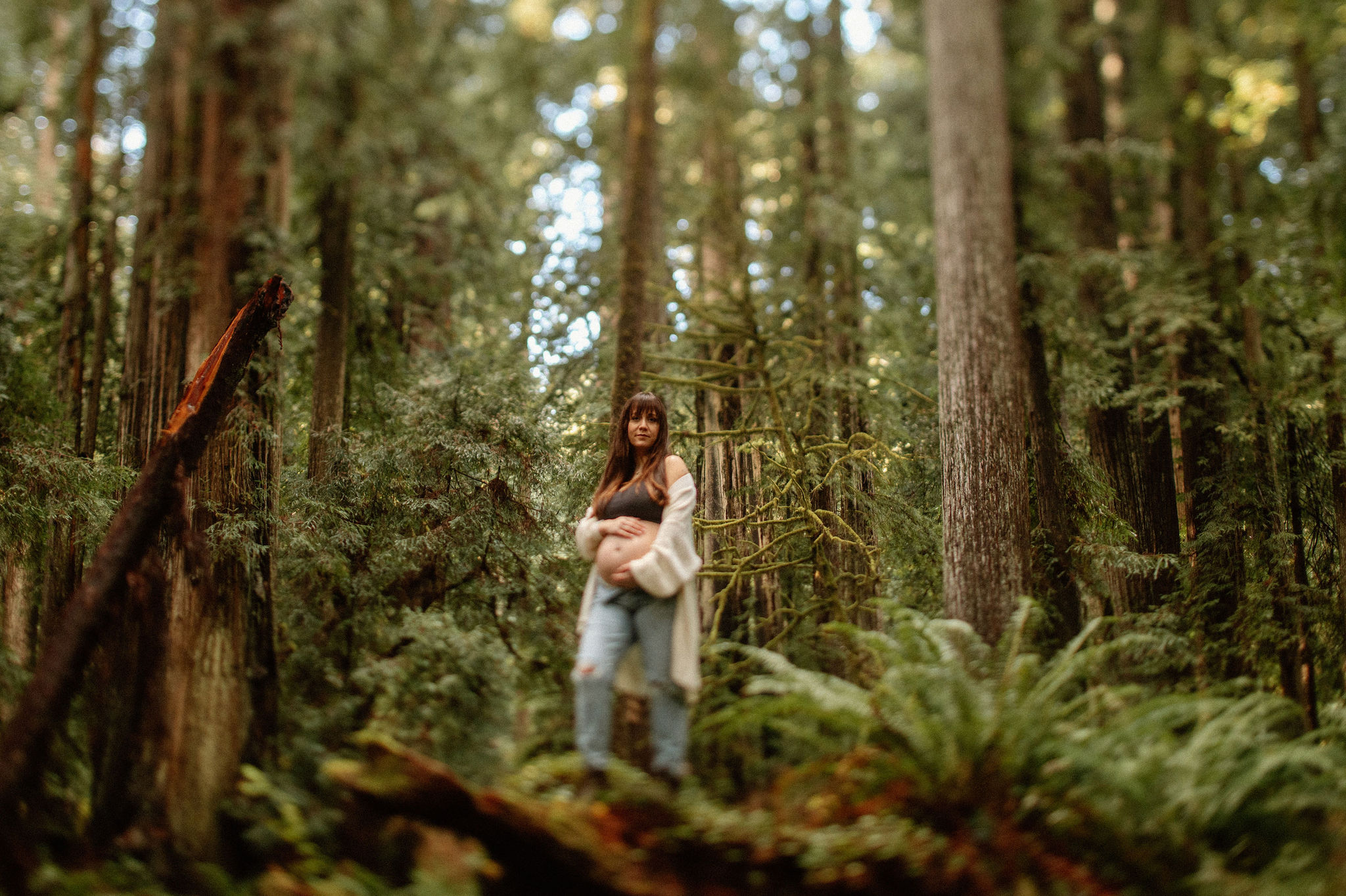 future mom poses during her Northern California maternity photoshoot in nature