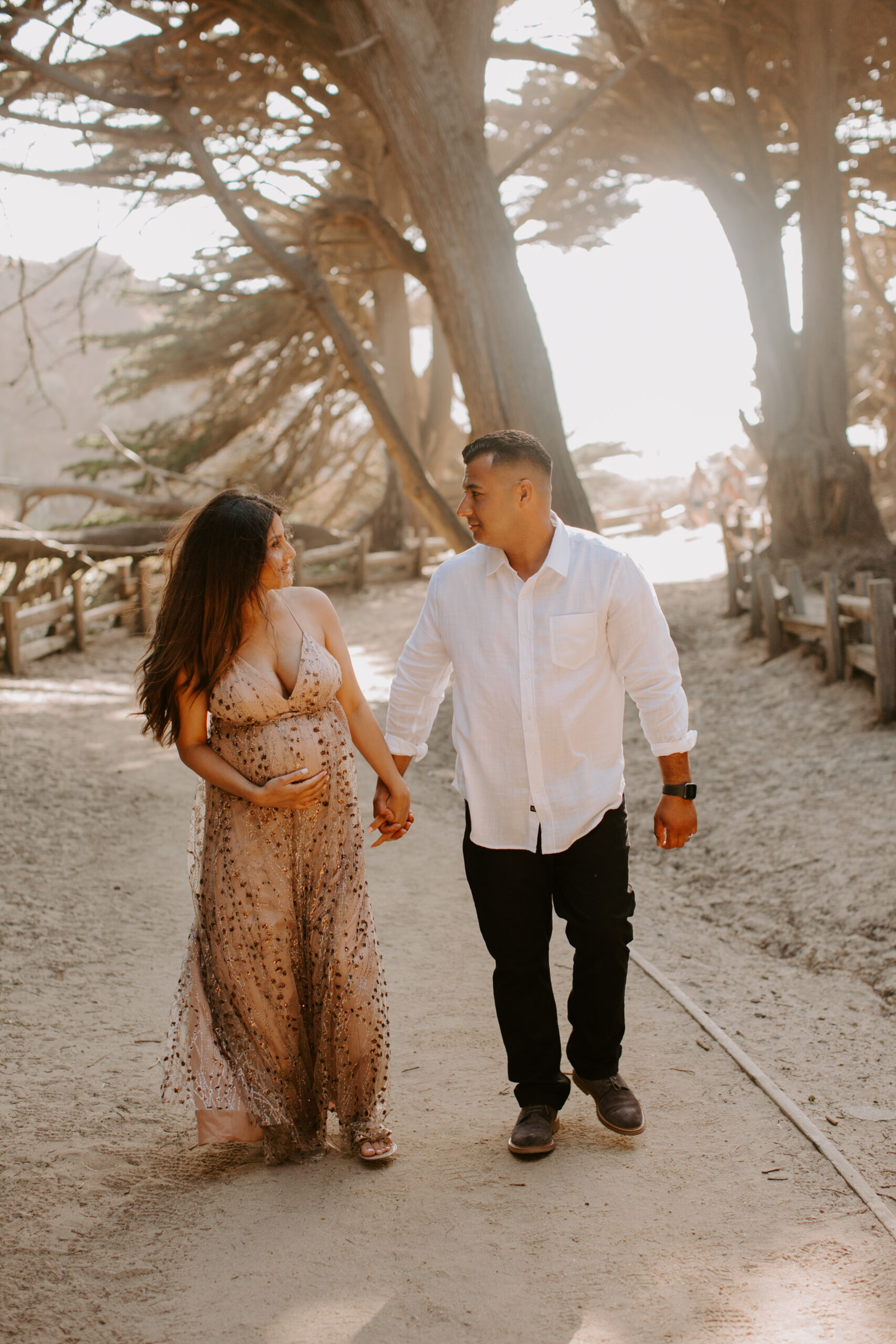 stunning couple pose together during their outdoor Northern California maternity photoshoot