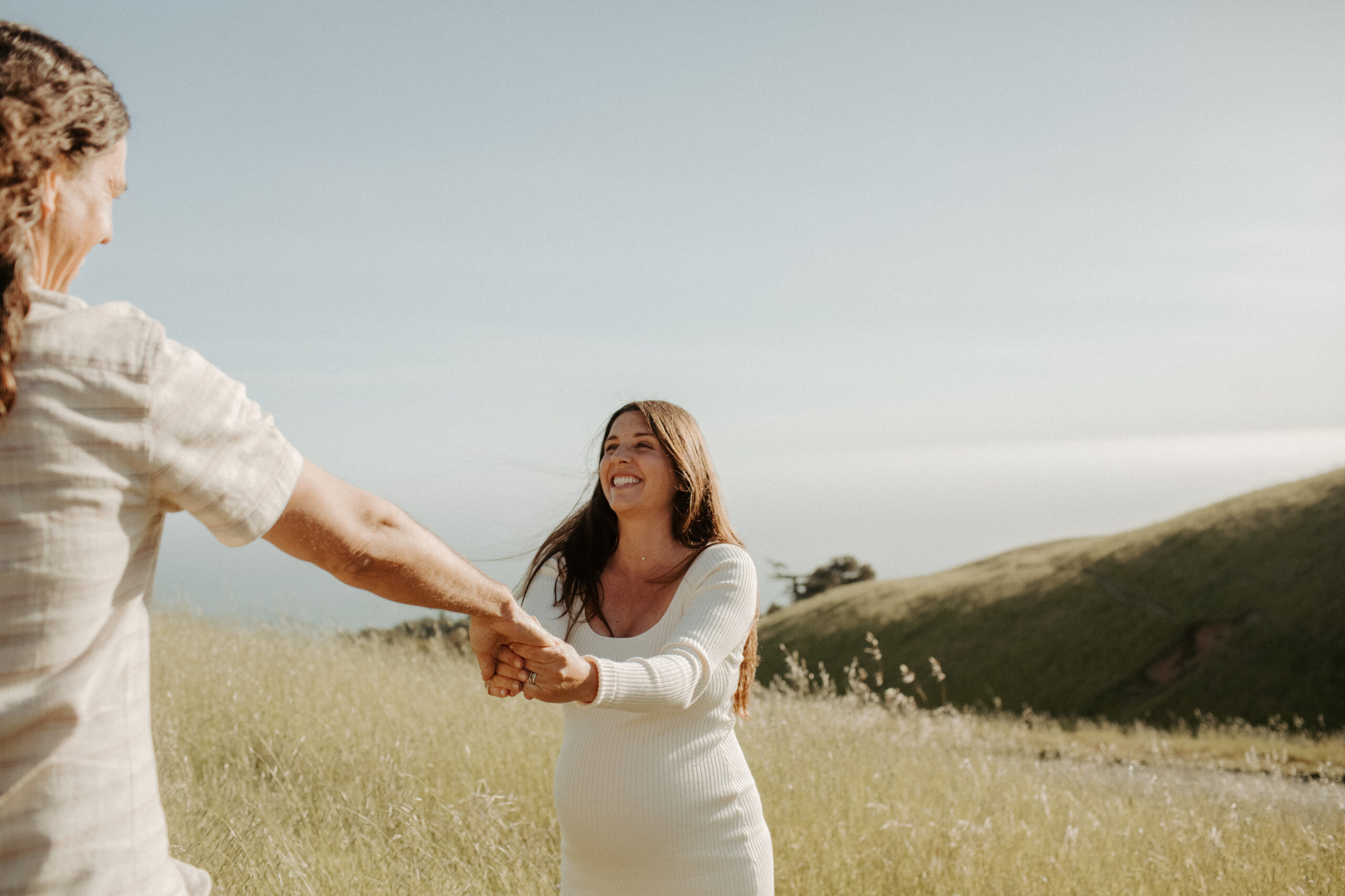 stunning couple pose together during their outdoor Northern California maternity photoshoot