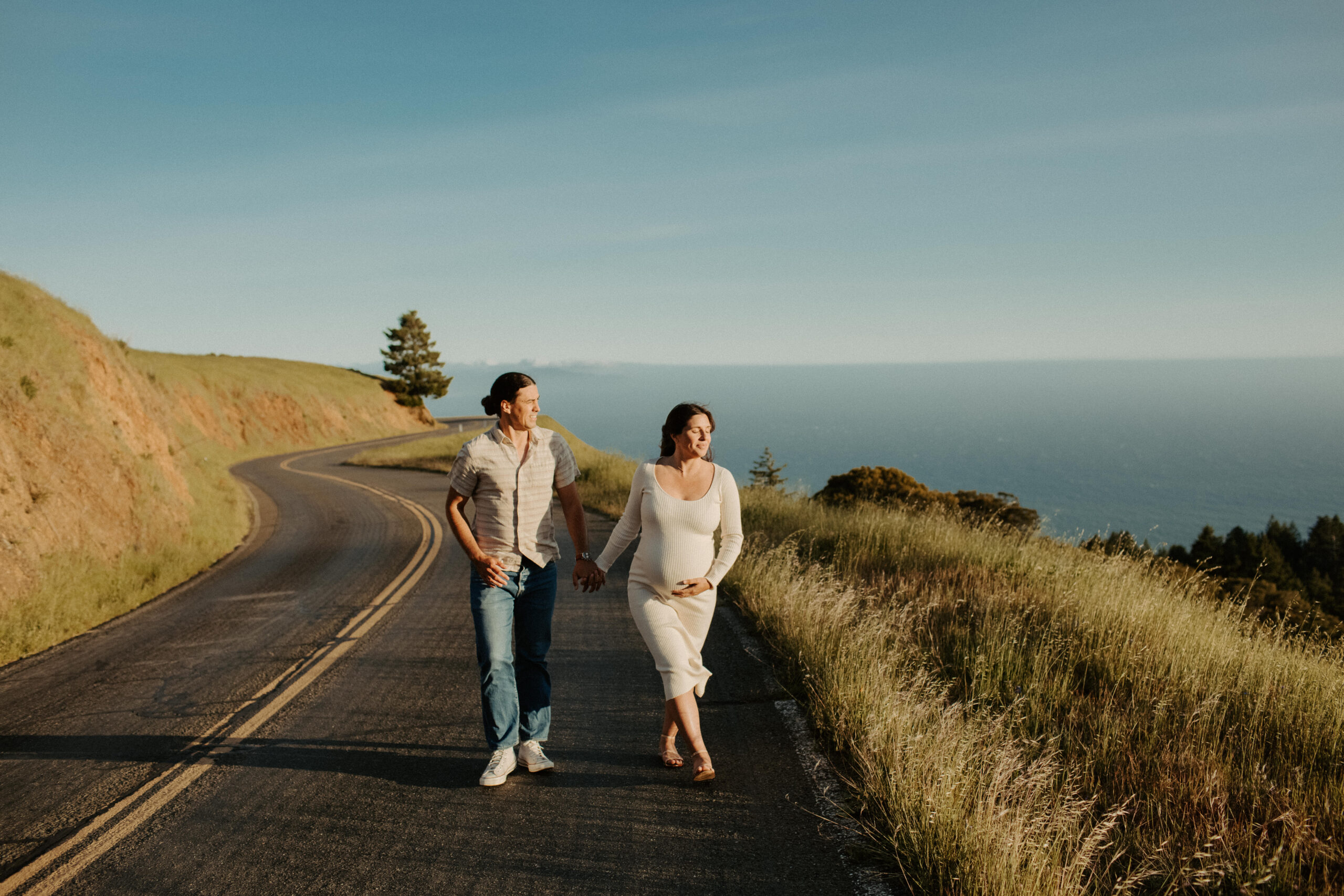 stunning couple pose together on the California coast