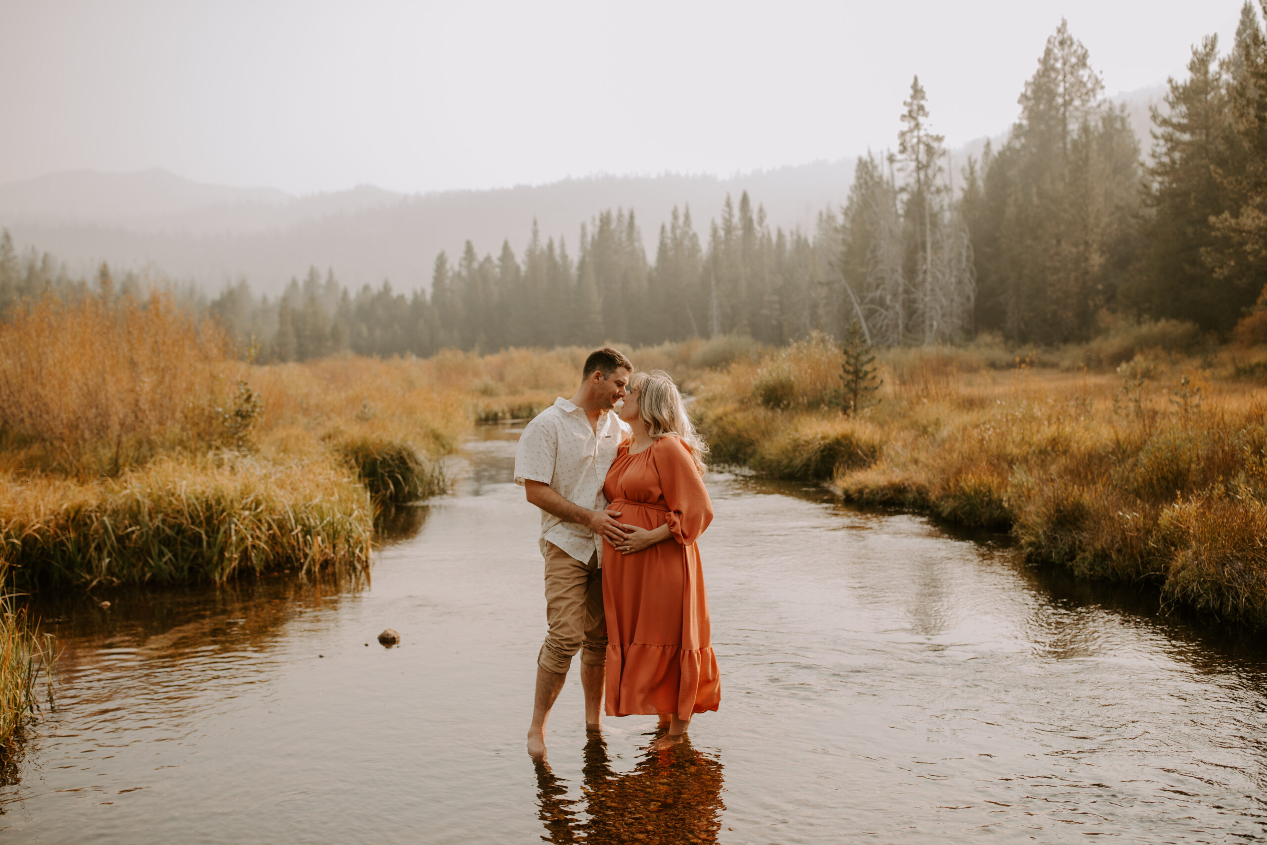 stunning couple pose together during their outdoor Northern California maternity photoshoot