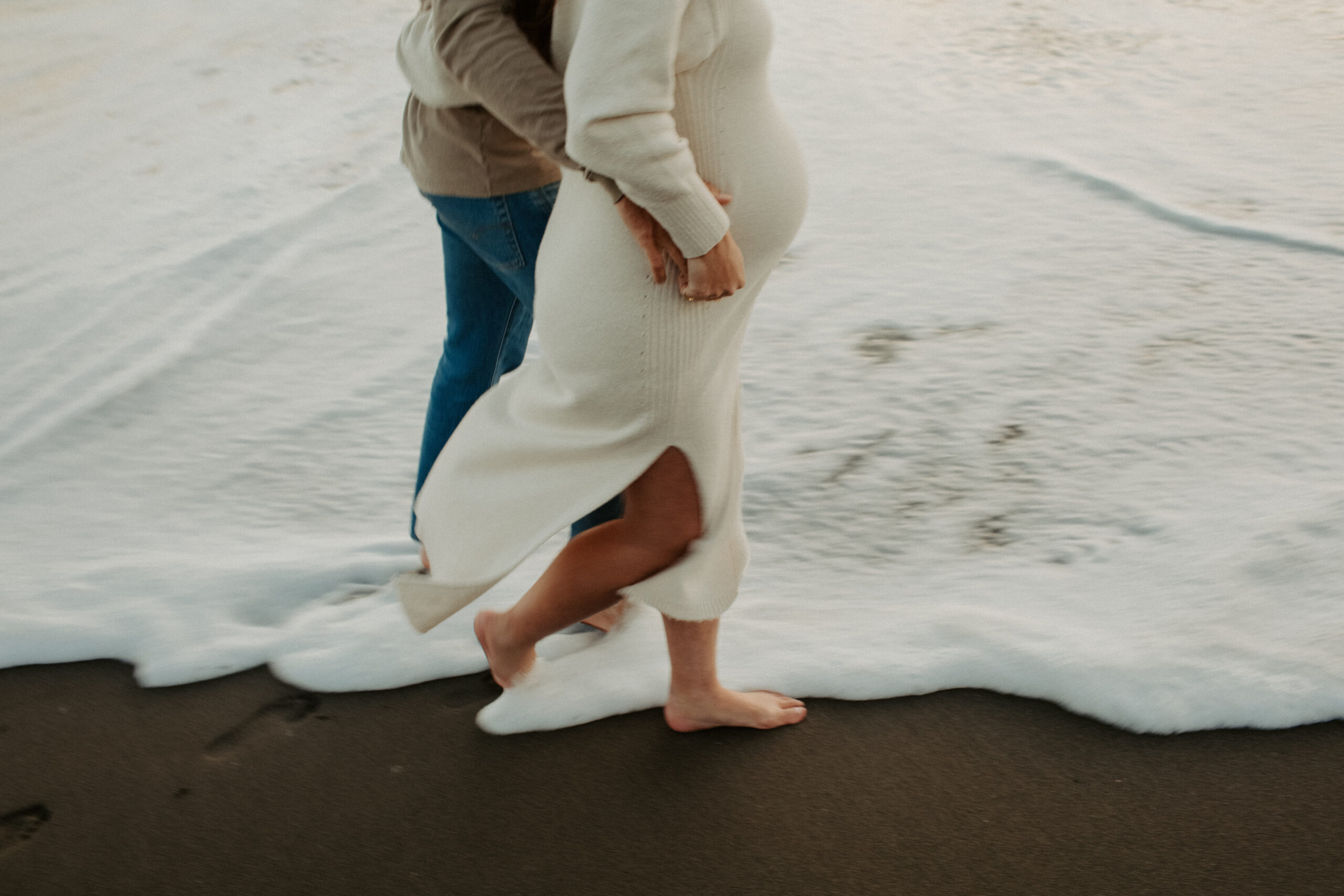 stunning couple pose together on the California coast