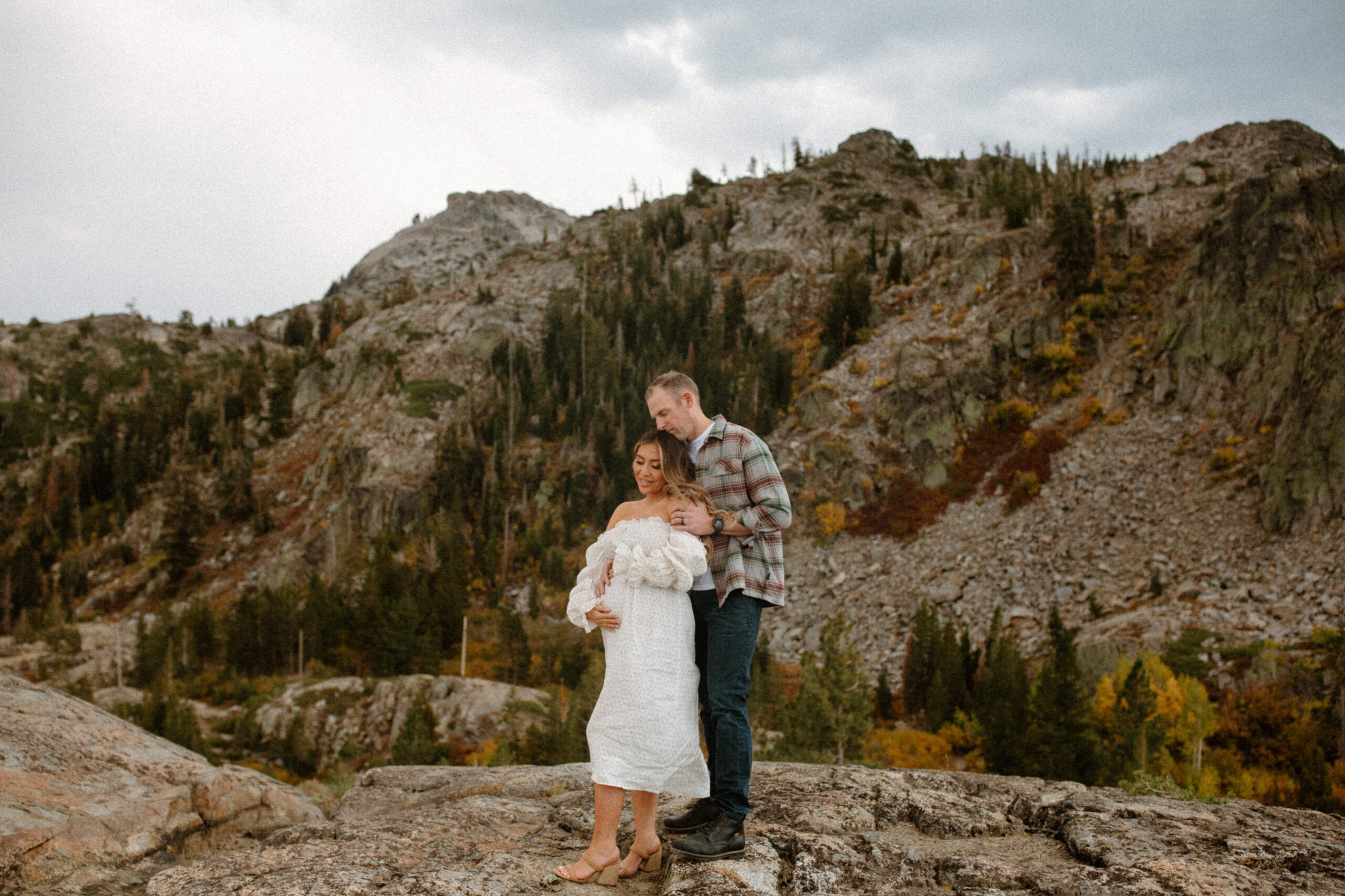 stunning couple pose together during their outdoor Northern California maternity photoshoot