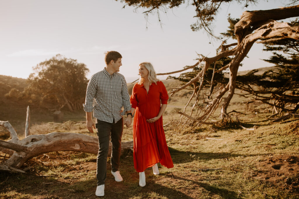 stunning couple pose together during their outdoor Northern California maternity photoshoot