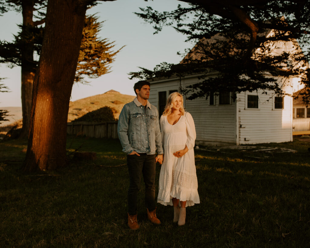 stunning couple pose together during their outdoor Northern California maternity photoshoot