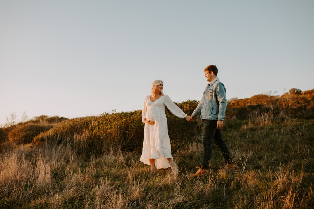 stunning couple pose together during their outdoor Northern California maternity photoshoot