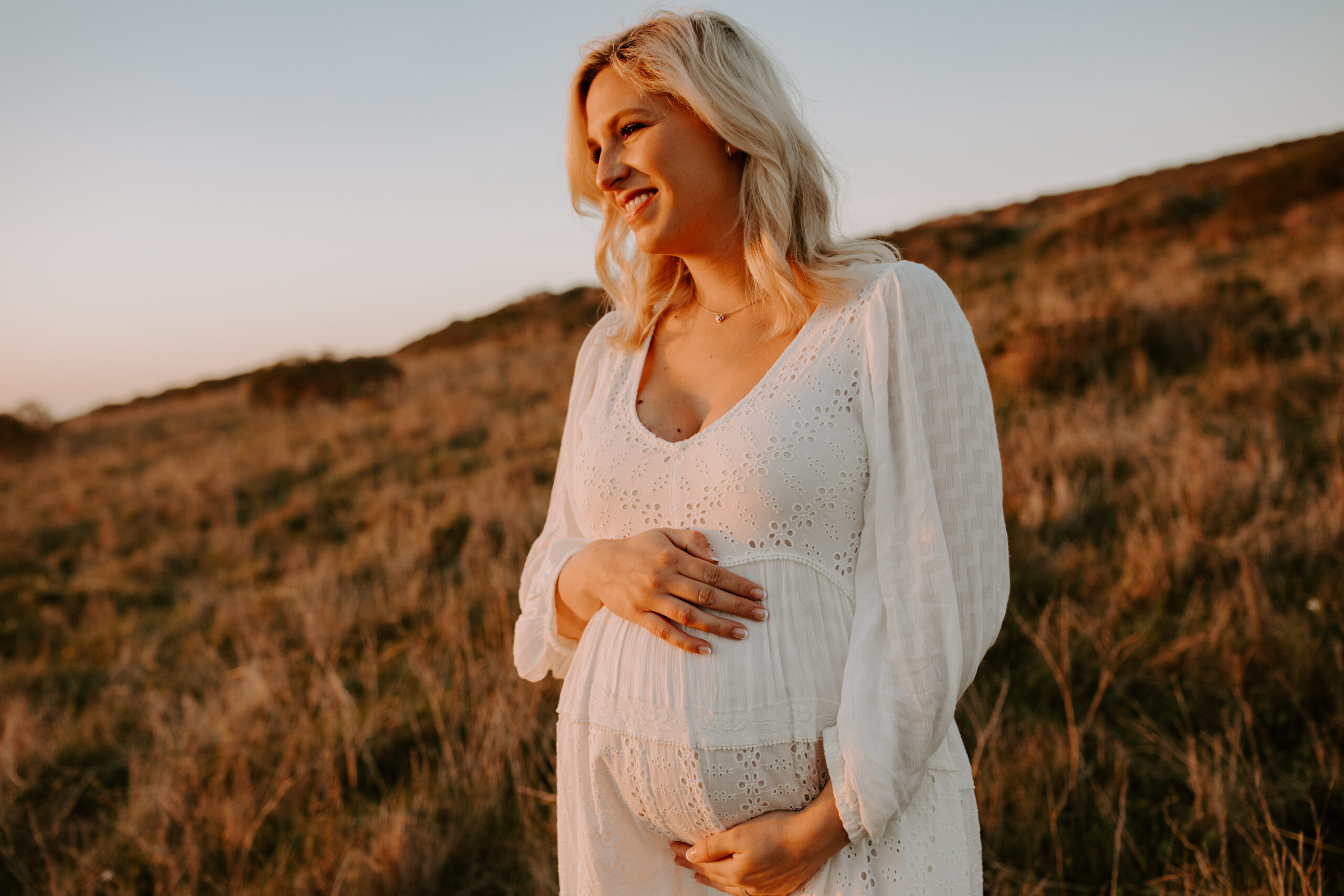 future mom poses during her Northern California maternity photoshoot in nature