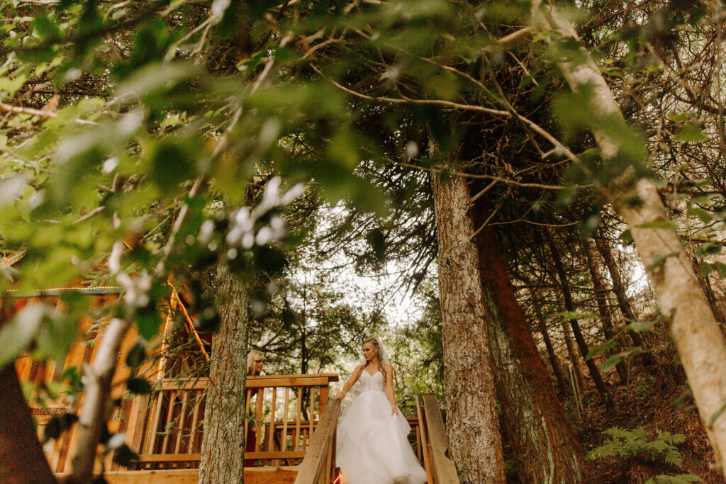 bride poses in the California forrest