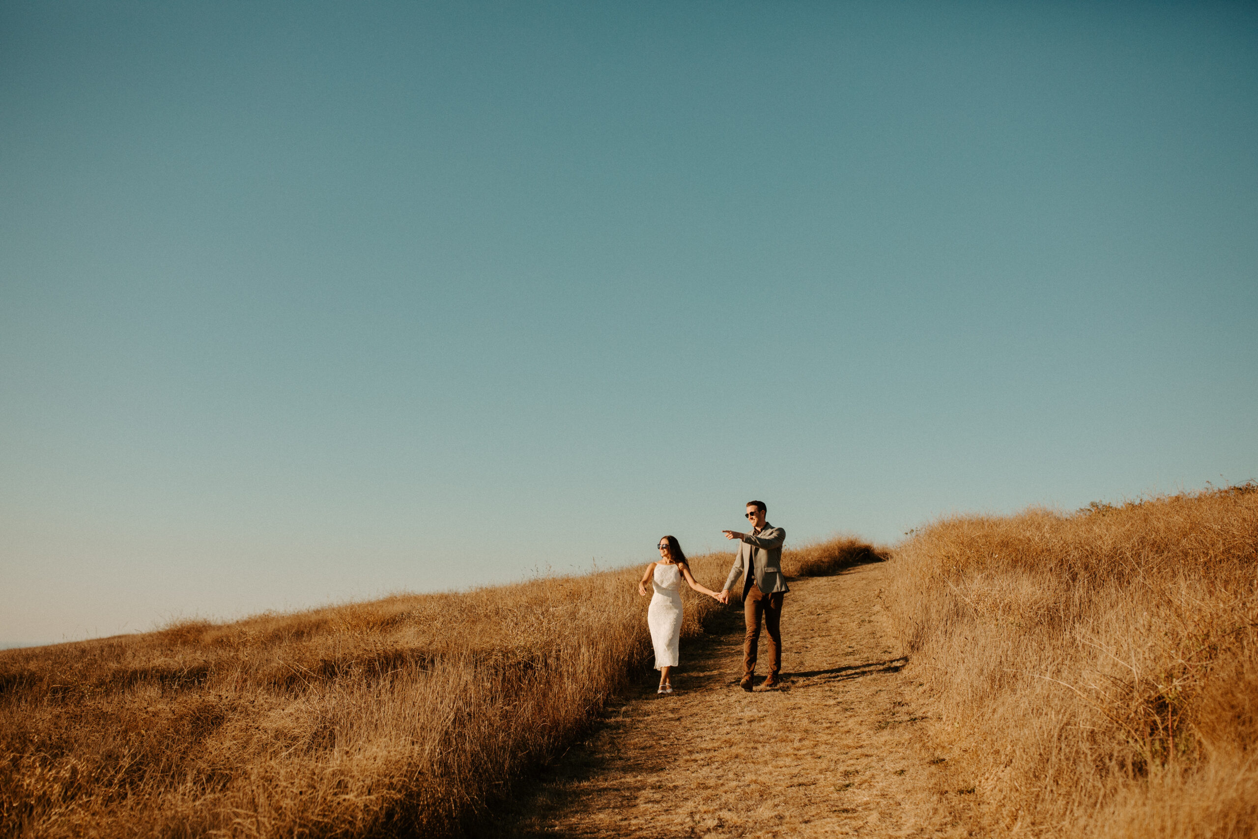 couple share an intimate moment during their documentary style engagement photoshoot