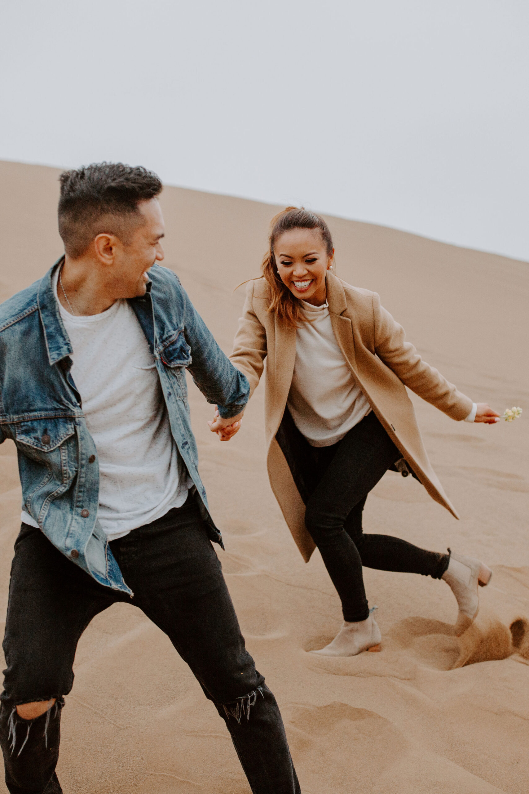 beautiful couple share an intimate moment during their candid California engagement photoshoot