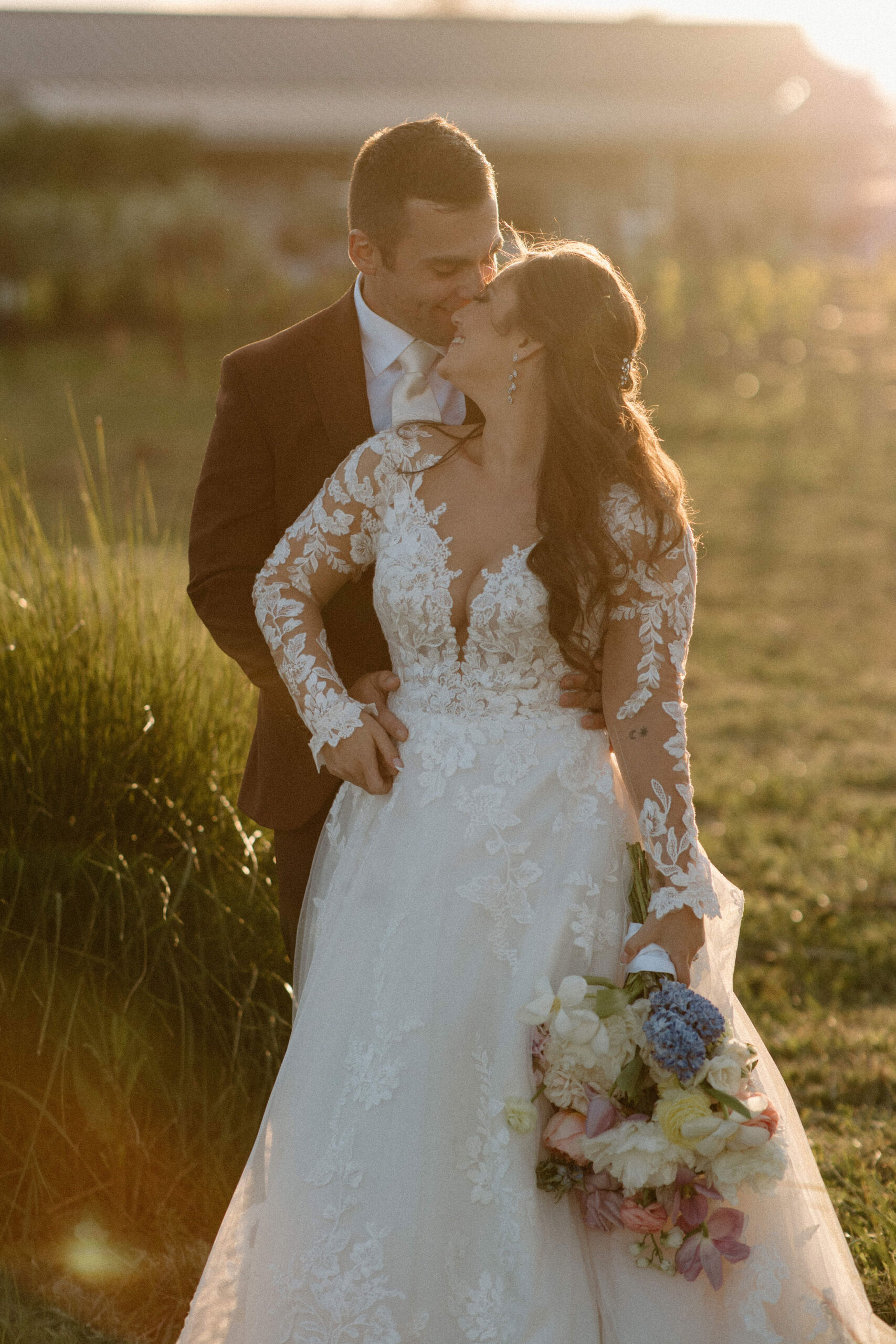 beautiful bride and groom take photos together in the California wine country