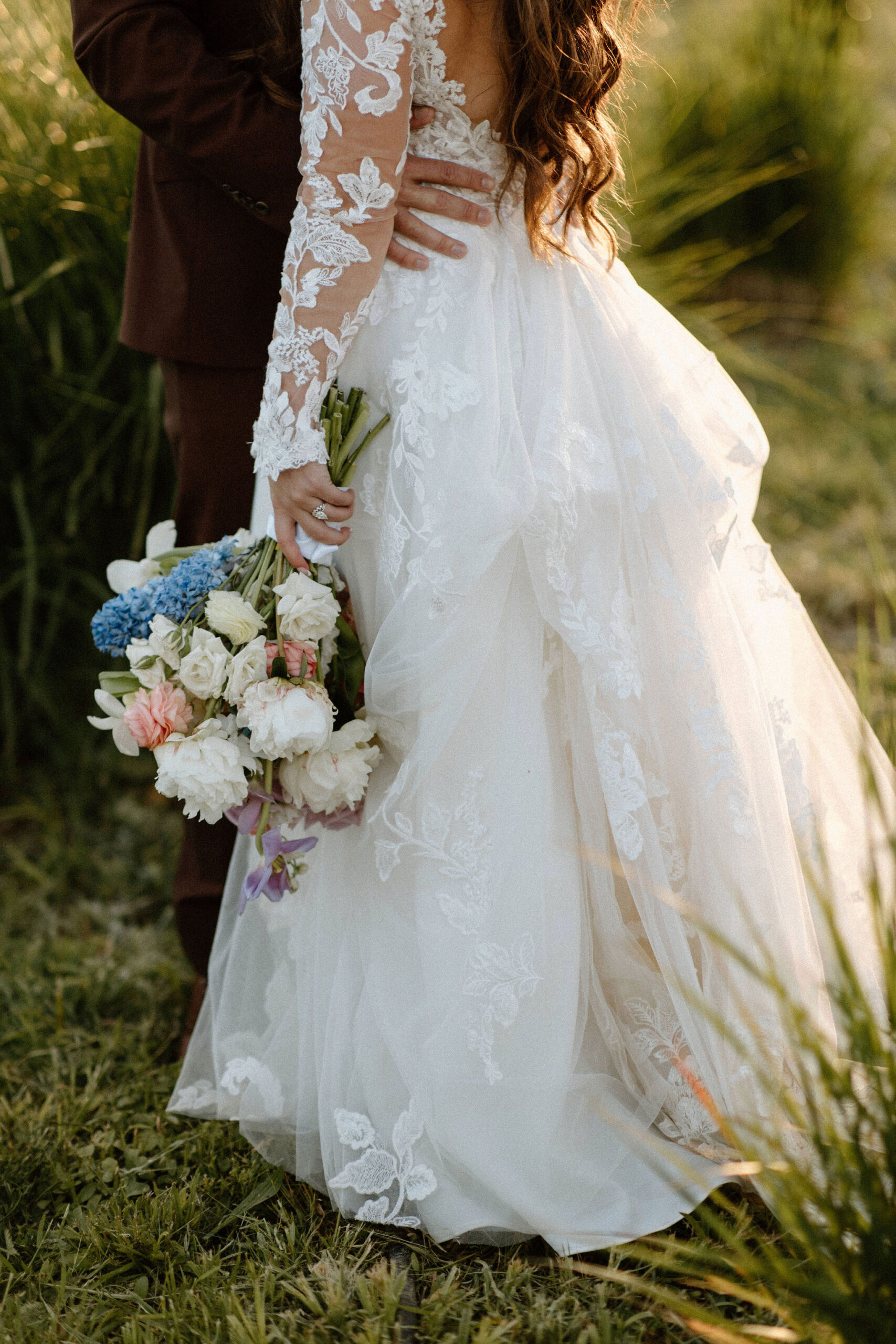 beautiful bride and groom take photos together in the California wine country