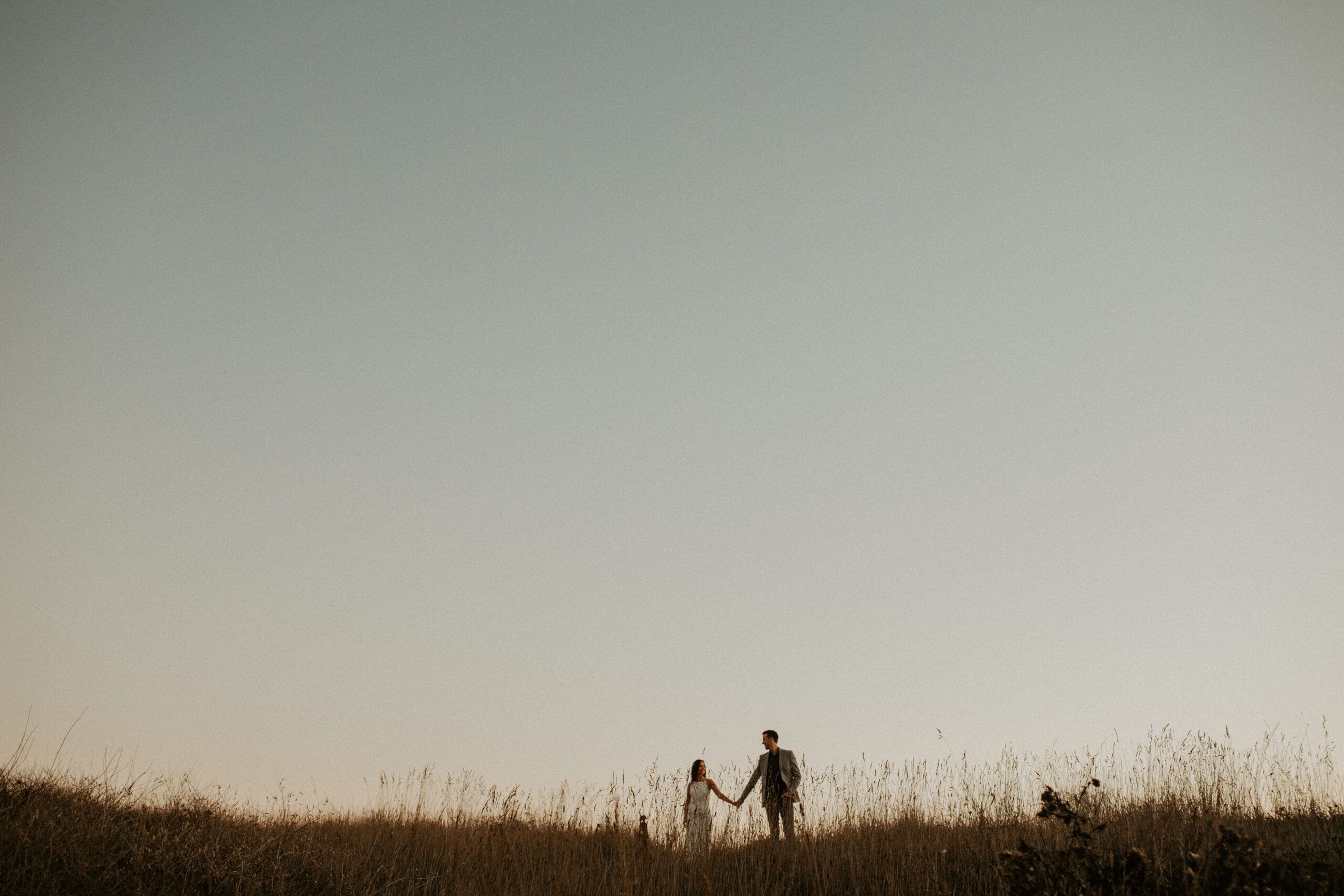 couple share an intimate moment during their documentary style engagement photoshoot